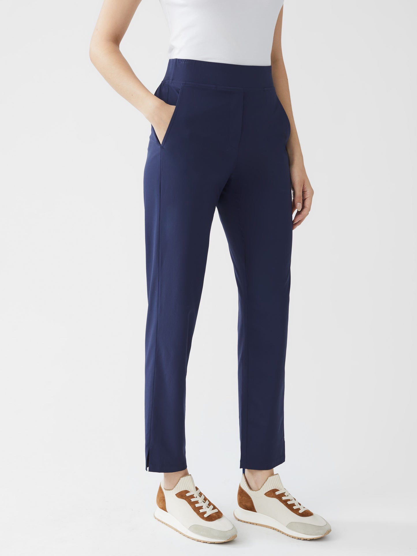 Model wearing J.McLaughlin Beasley pants in navy made with polyester/spandex.