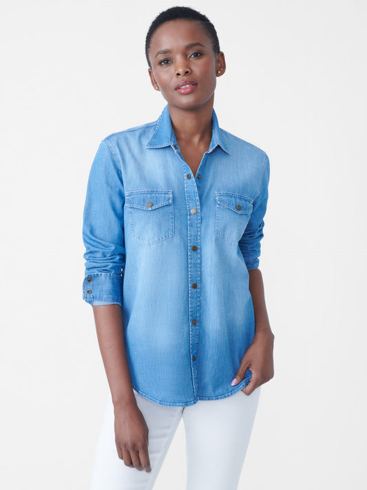 Model wearing J.McLaughlin Miris shirt in denim made with cotton/elastane.
