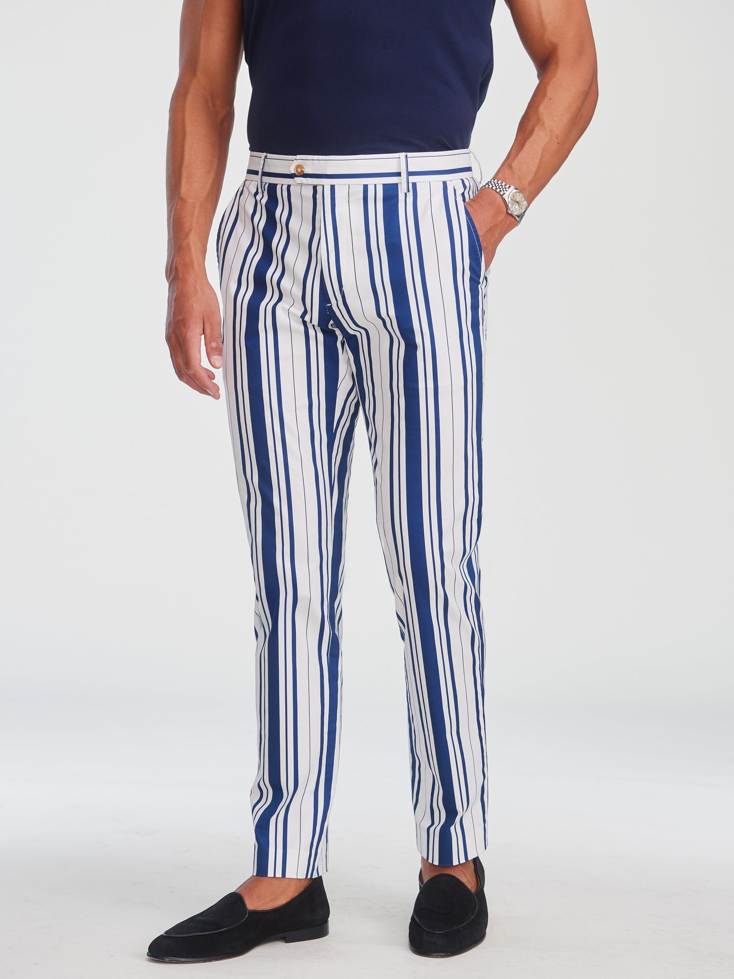 Man wearing Madison Fancy Pants in Mariner Stripe by J.McLaughlin, featuring bold vertical blue and white stripes paired with black loafers, embodying effortlessly stylish and enduring designs from a destination for defining style. Life, Well-Lived.