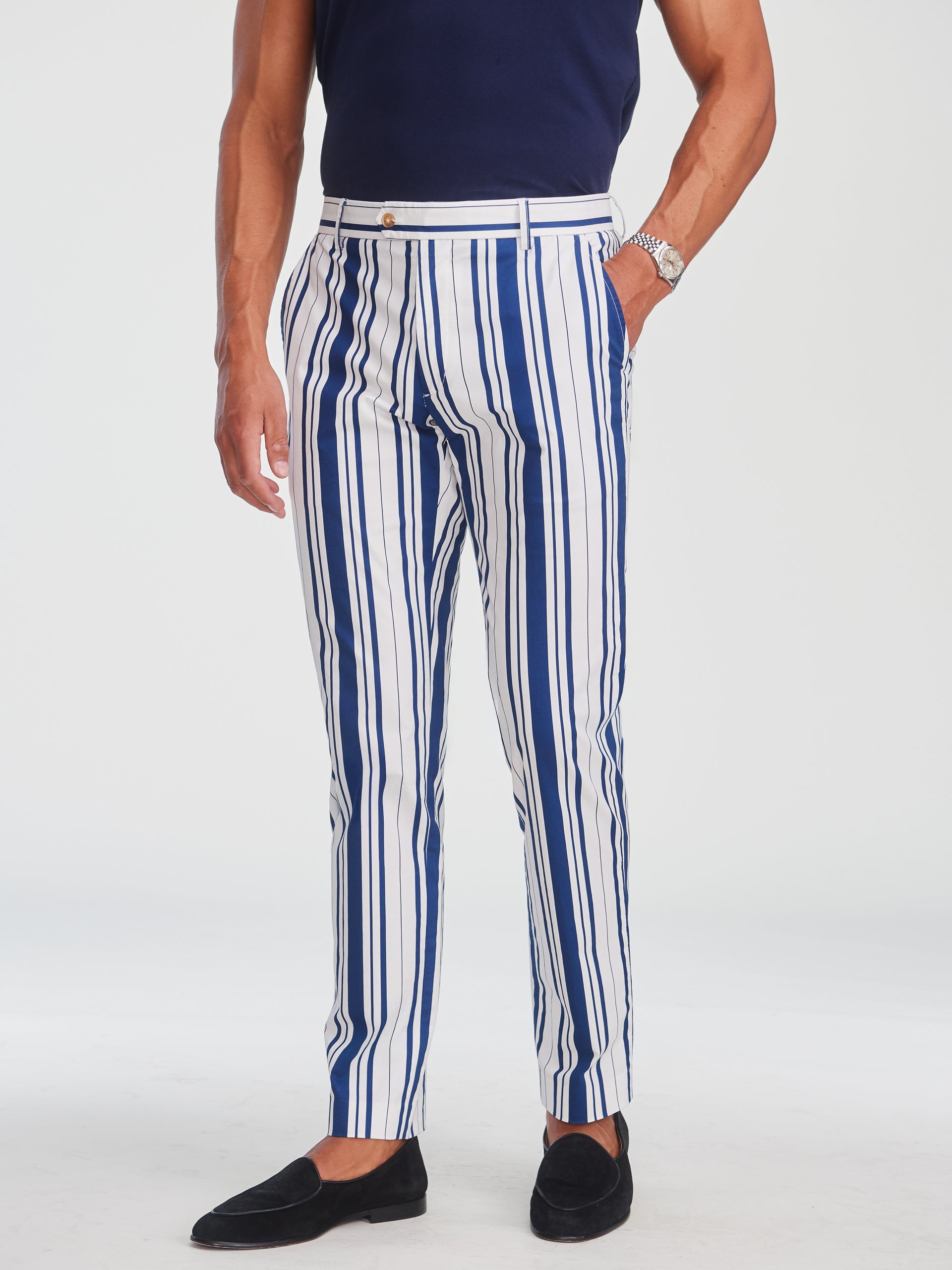 Man wearing Madison Fancy Pants in Mariner Stripe by J.McLaughlin, featuring bold vertical blue and white stripes paired with black loafers, embodying effortlessly stylish and enduring designs from a destination for defining style. Life, Well-Lived.