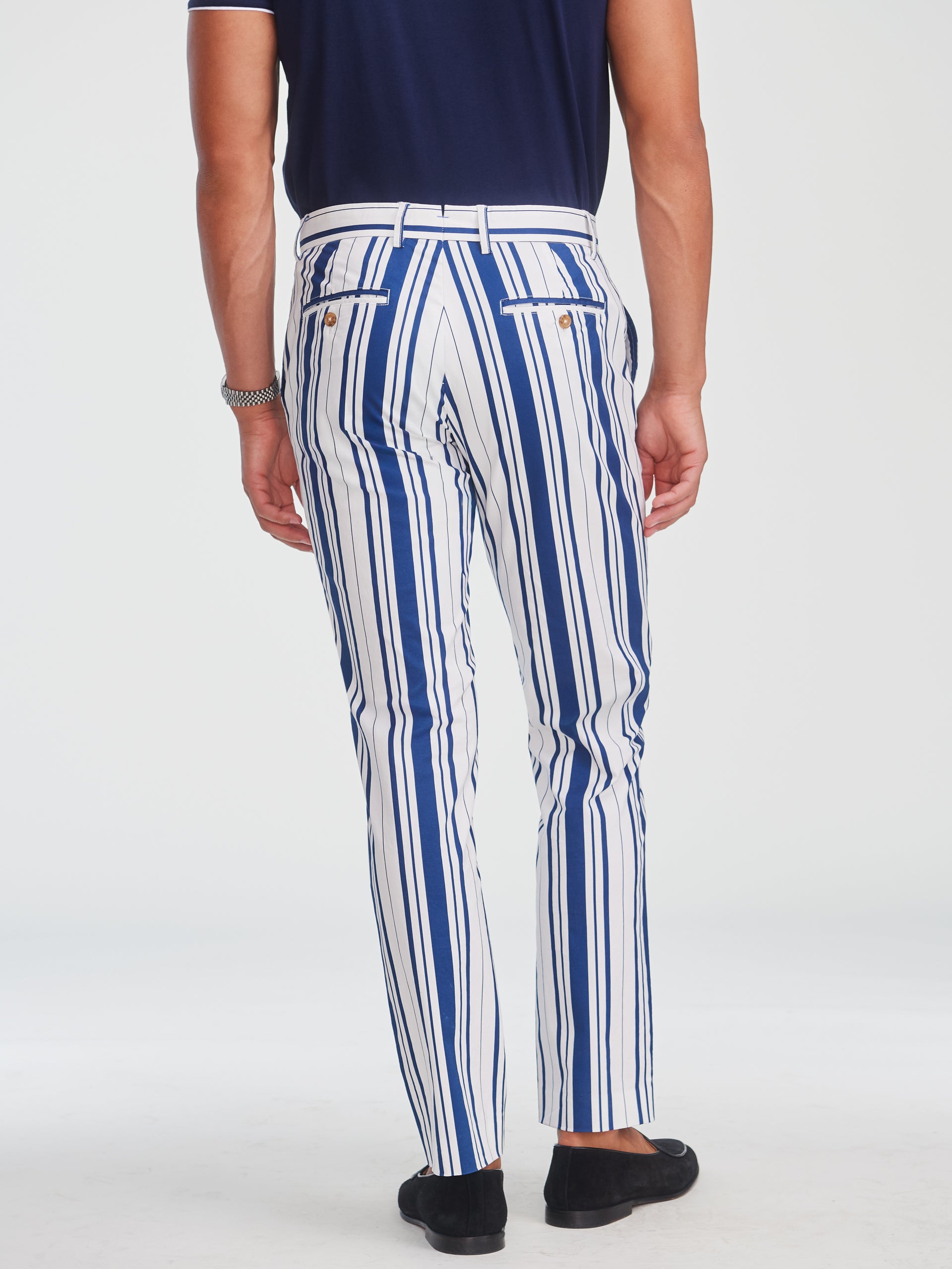 Back view of a man wearing Madison Fancy Pants in Mariner Stripe by J.McLaughlin, featuring timeless vertical blue and white stripes, combining effortlessly stylish design with enduring appeal.