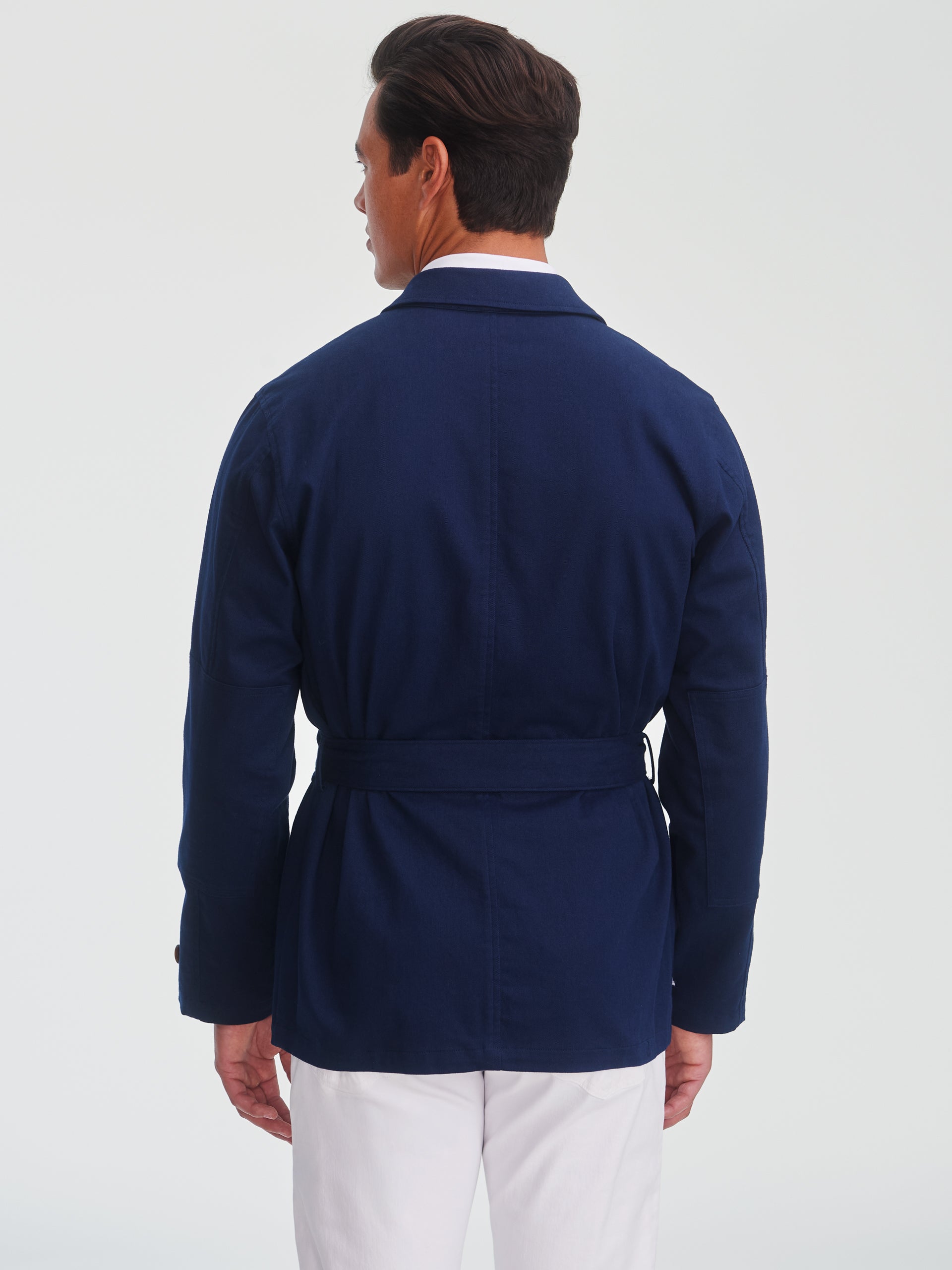 Back view of a man wearing the Michael Jacket by J.McLaughlin in navy, showcasing effortlessly stylish, enduring designs with innovative fabrics for a legacy of timeless fashion. A destination for defining style. Life, Well-Lived.