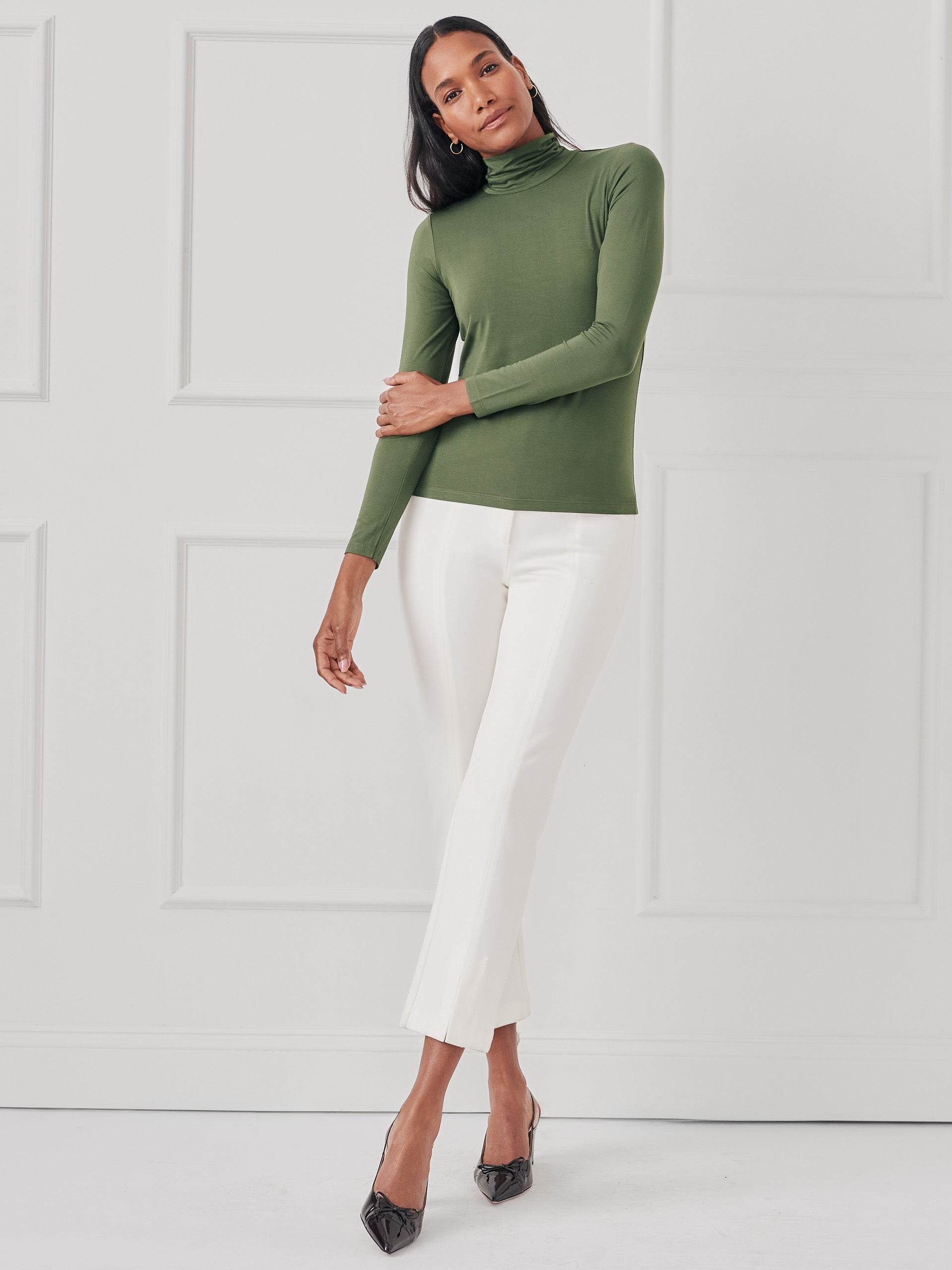 J.mcLaughlin Nadia turtleneck in cypress made with stretch rayon.