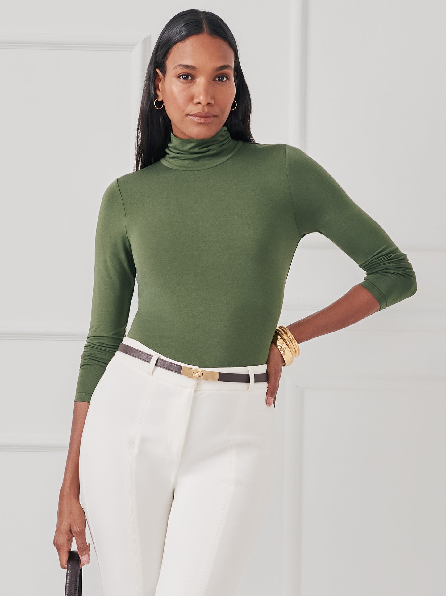 J.mcLaughlin Nadia turtleneck in cypress made with stretch rayon.
