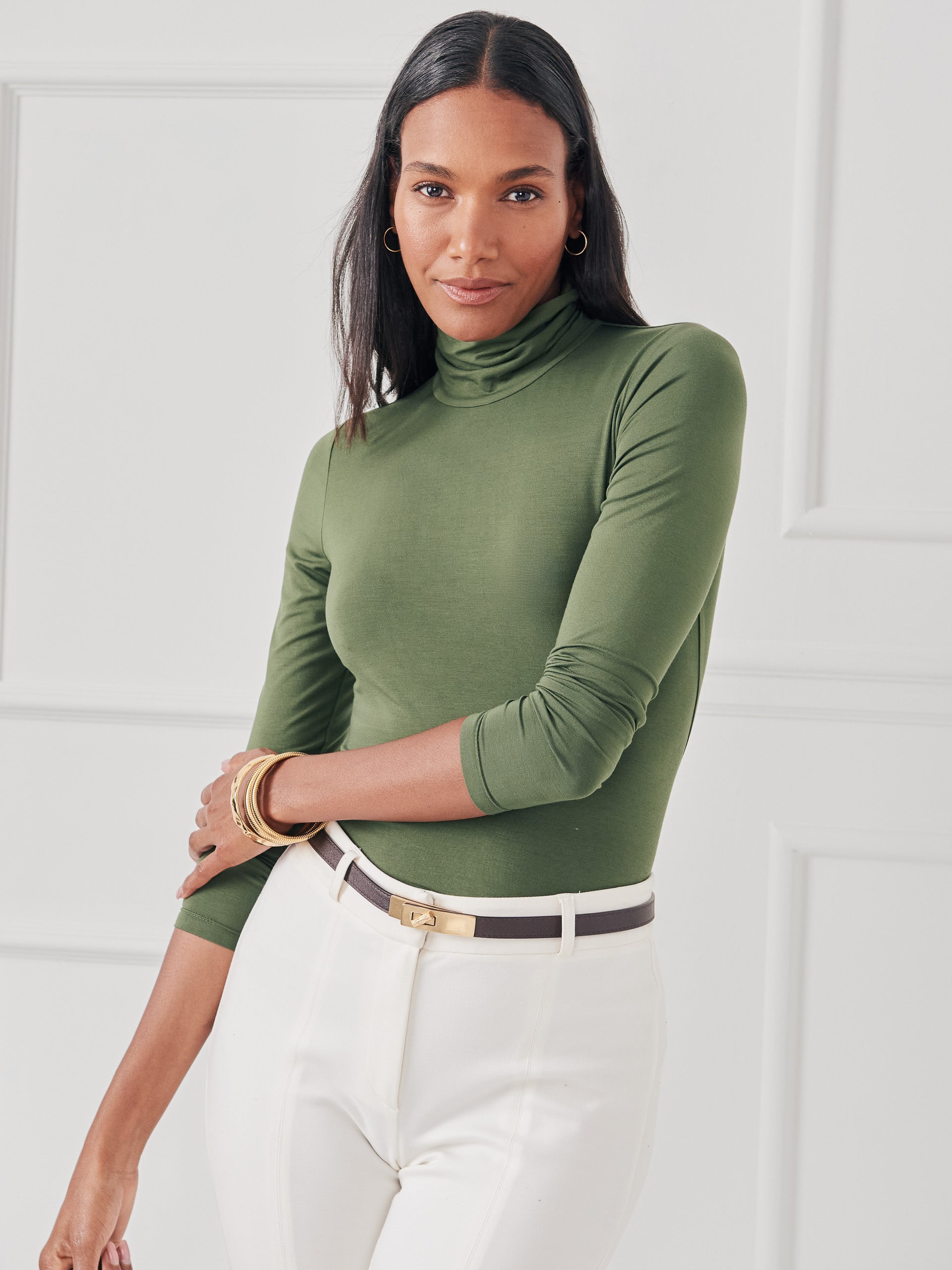 J.mcLaughlin Nadia turtleneck in cypress made with stretch rayon.
