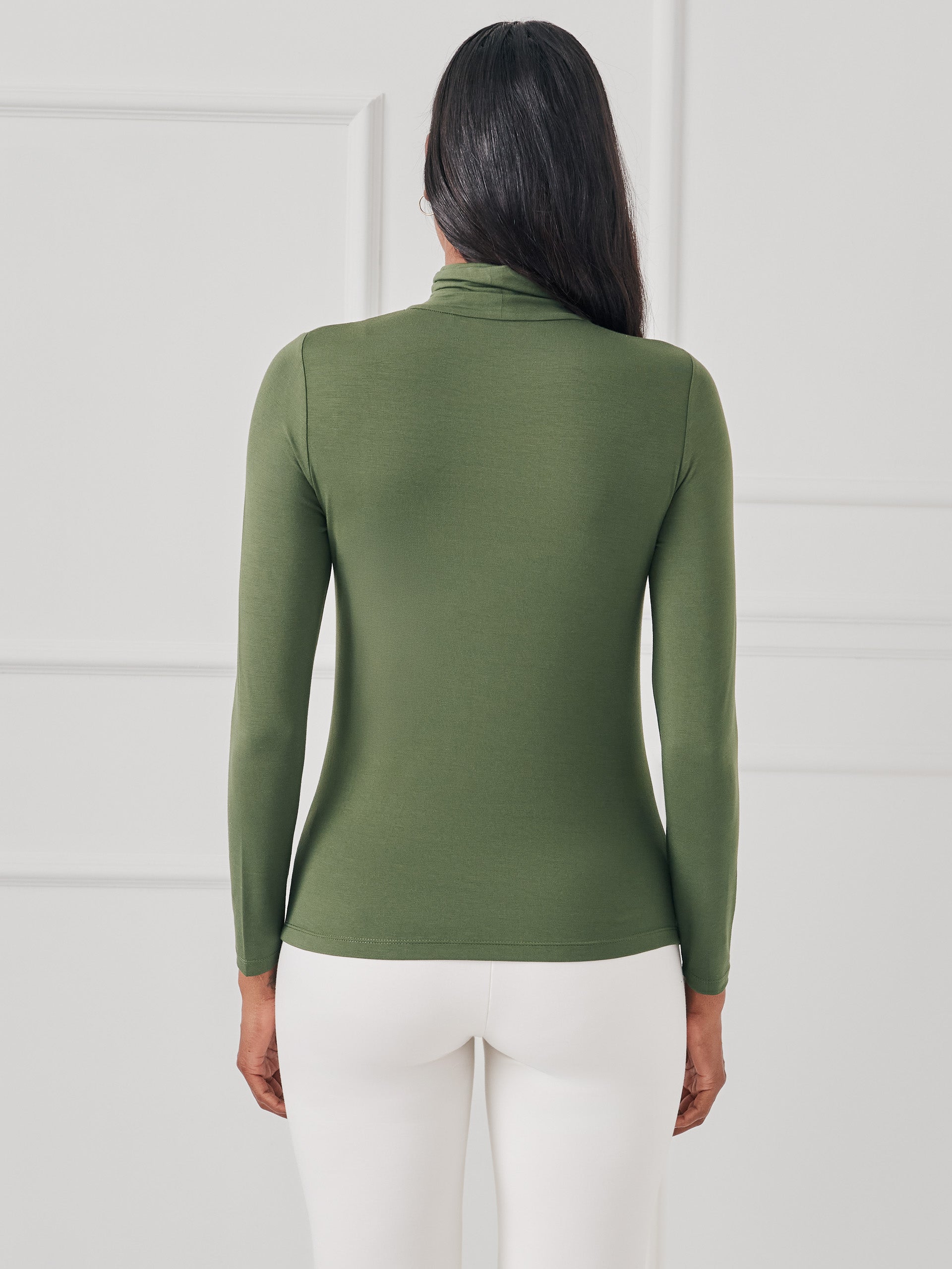 J.mcLaughlin Nadia turtleneck in cypress made with stretch rayon.