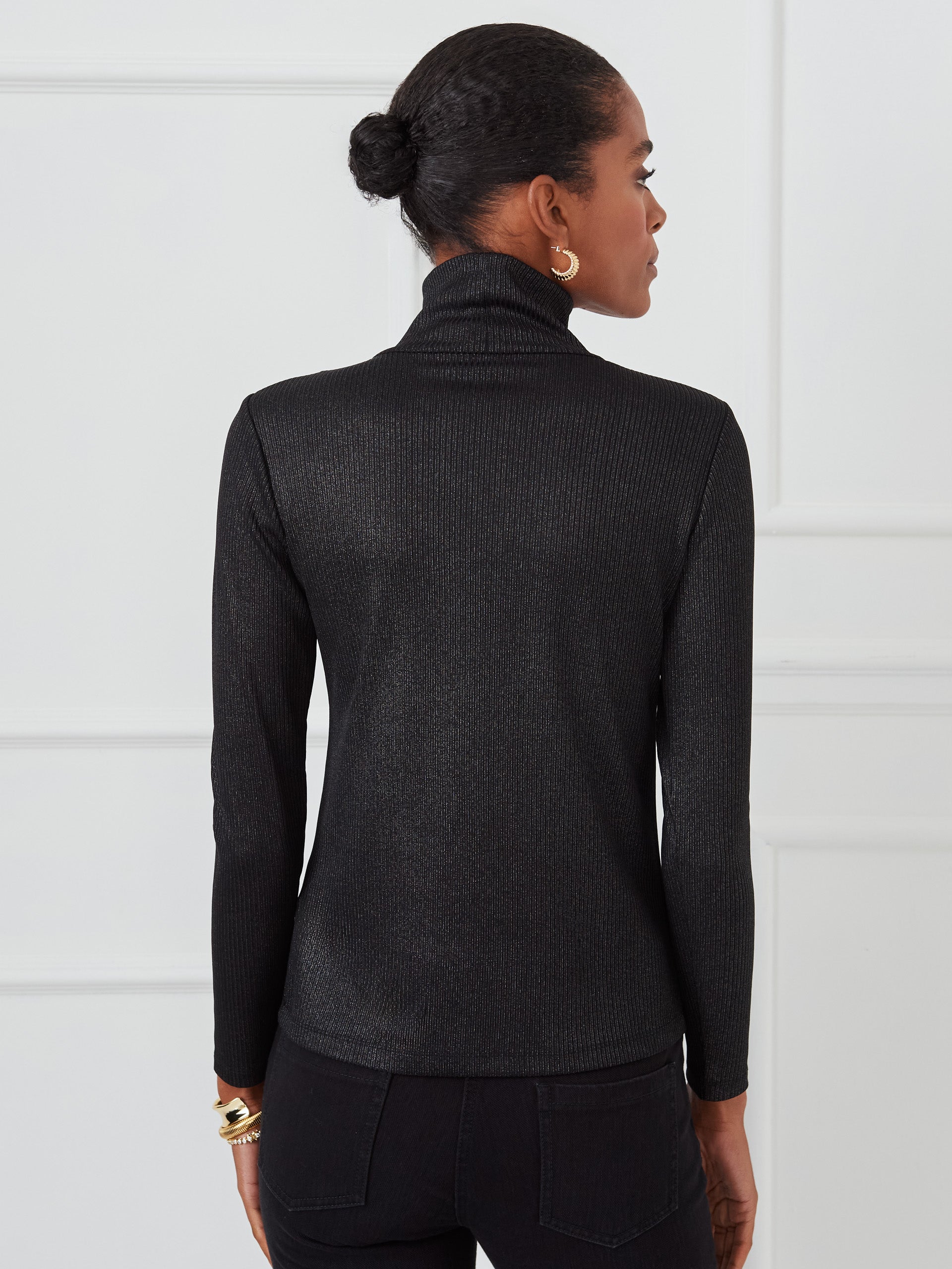 J.McLaughlin Nadia turtleneck in black/silver made with metallic ribbed knit fabric.