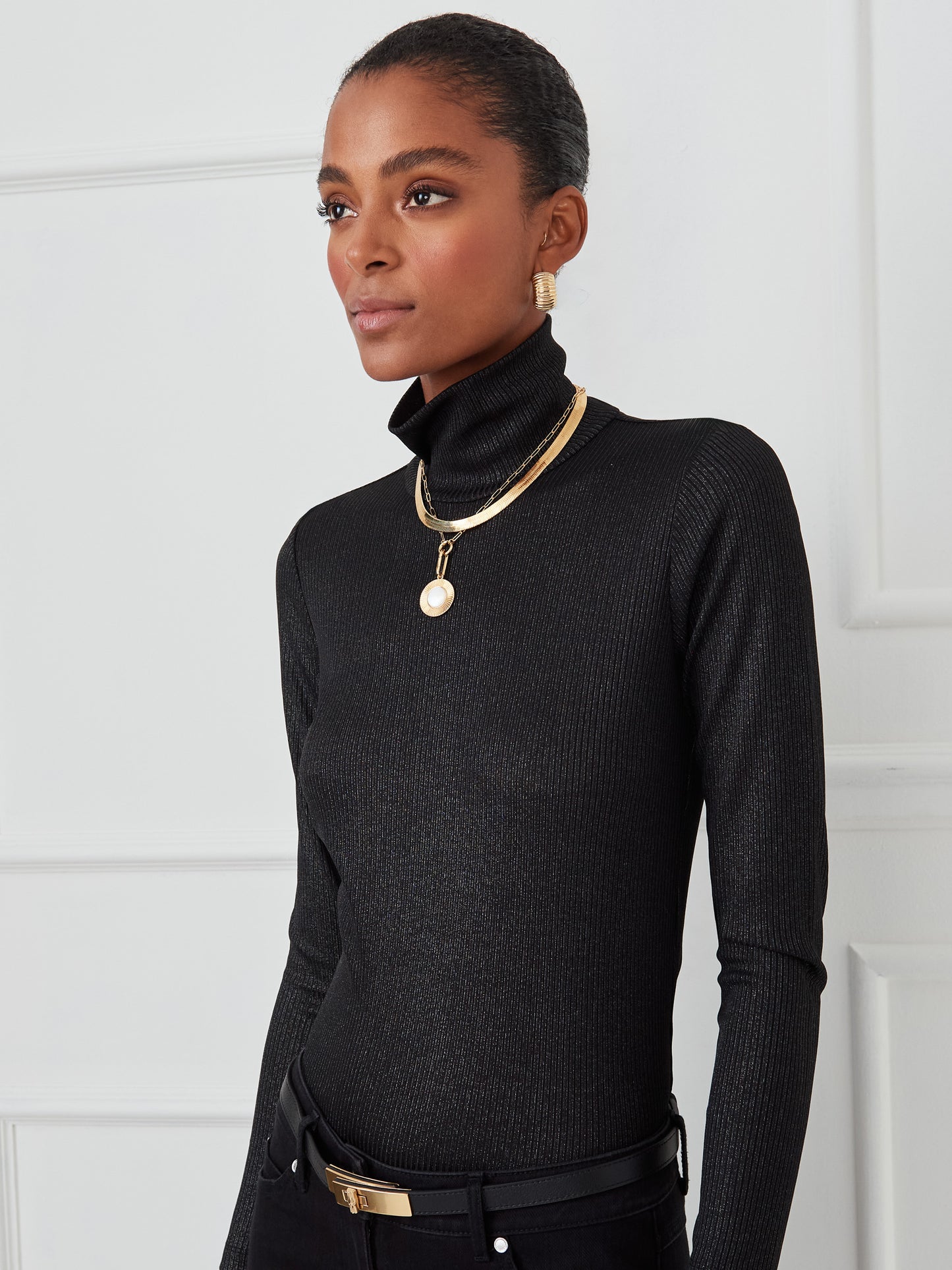 J.McLaughlin Nadia turtleneck in black/silver made with metallic ribbed knit fabric.