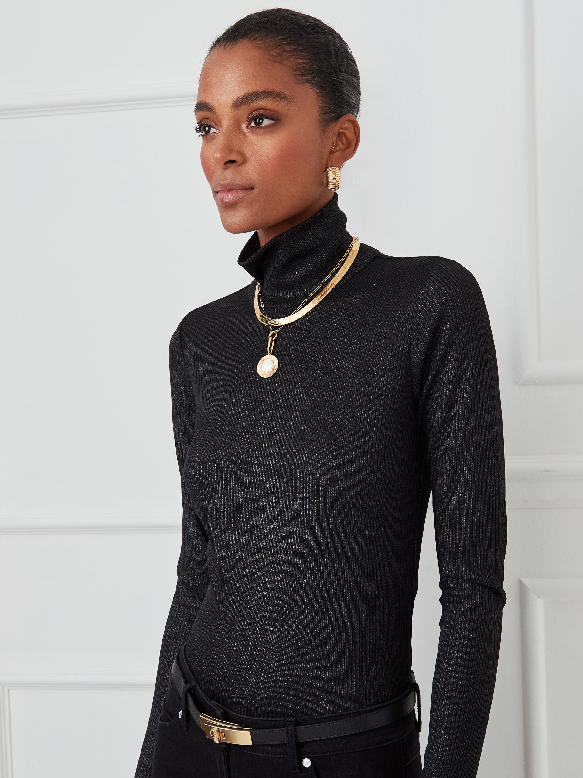 J.McLaughlin Nadia turtleneck in black/silver made with metallic ribbed knit fabric.