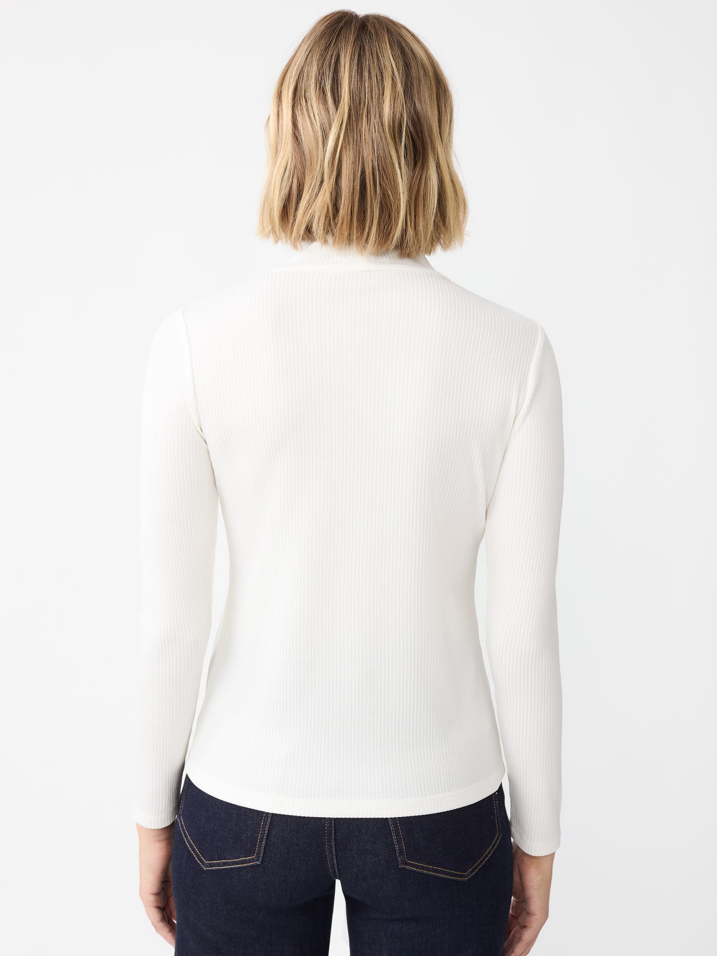 J.McLaughlin Nadia turtleneck in cream/silver made with metallic ribbed knit fabric.