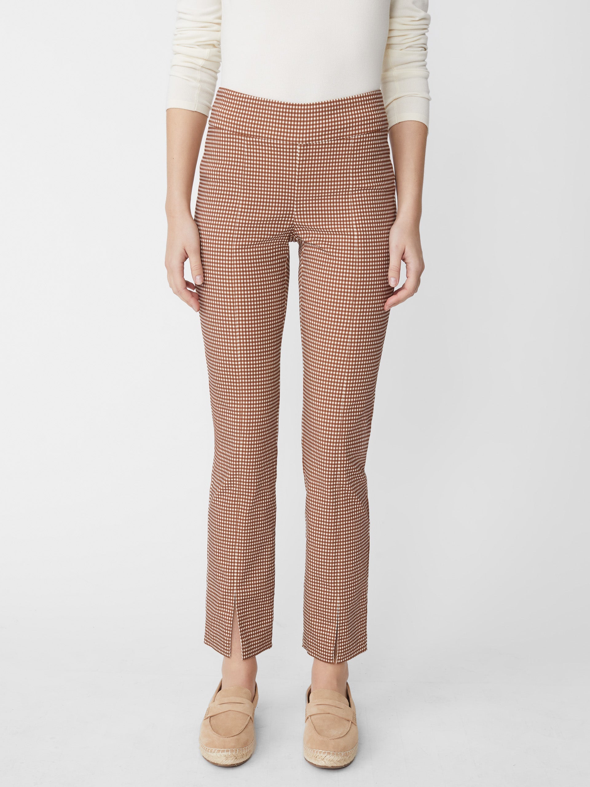 Model wears J.McLaughlin Jaydan pants in brown/cream made with Amelia Cloth.