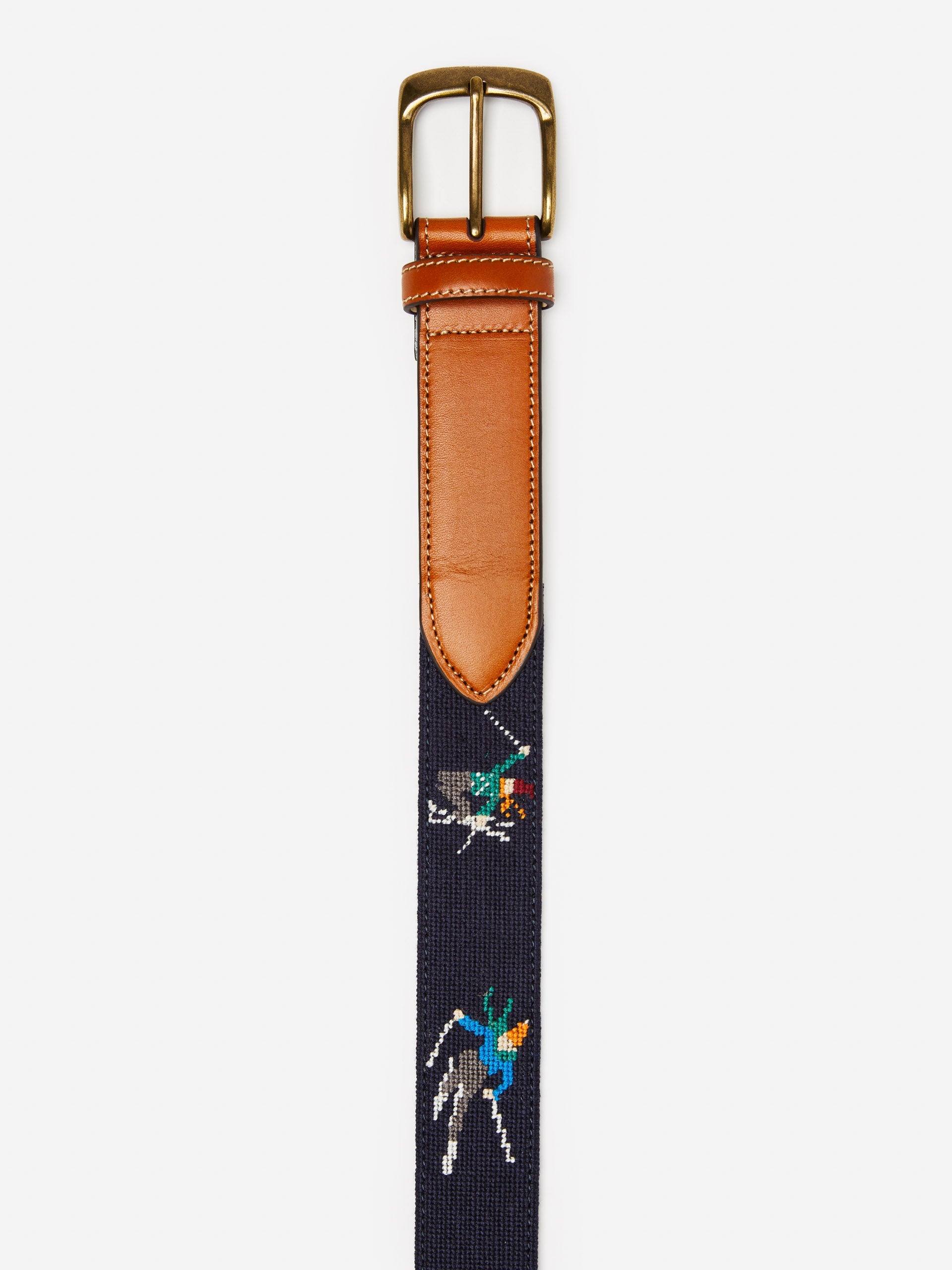 J.McLaughlin Needlepoint belt in navy made with leather and cotton webbing.