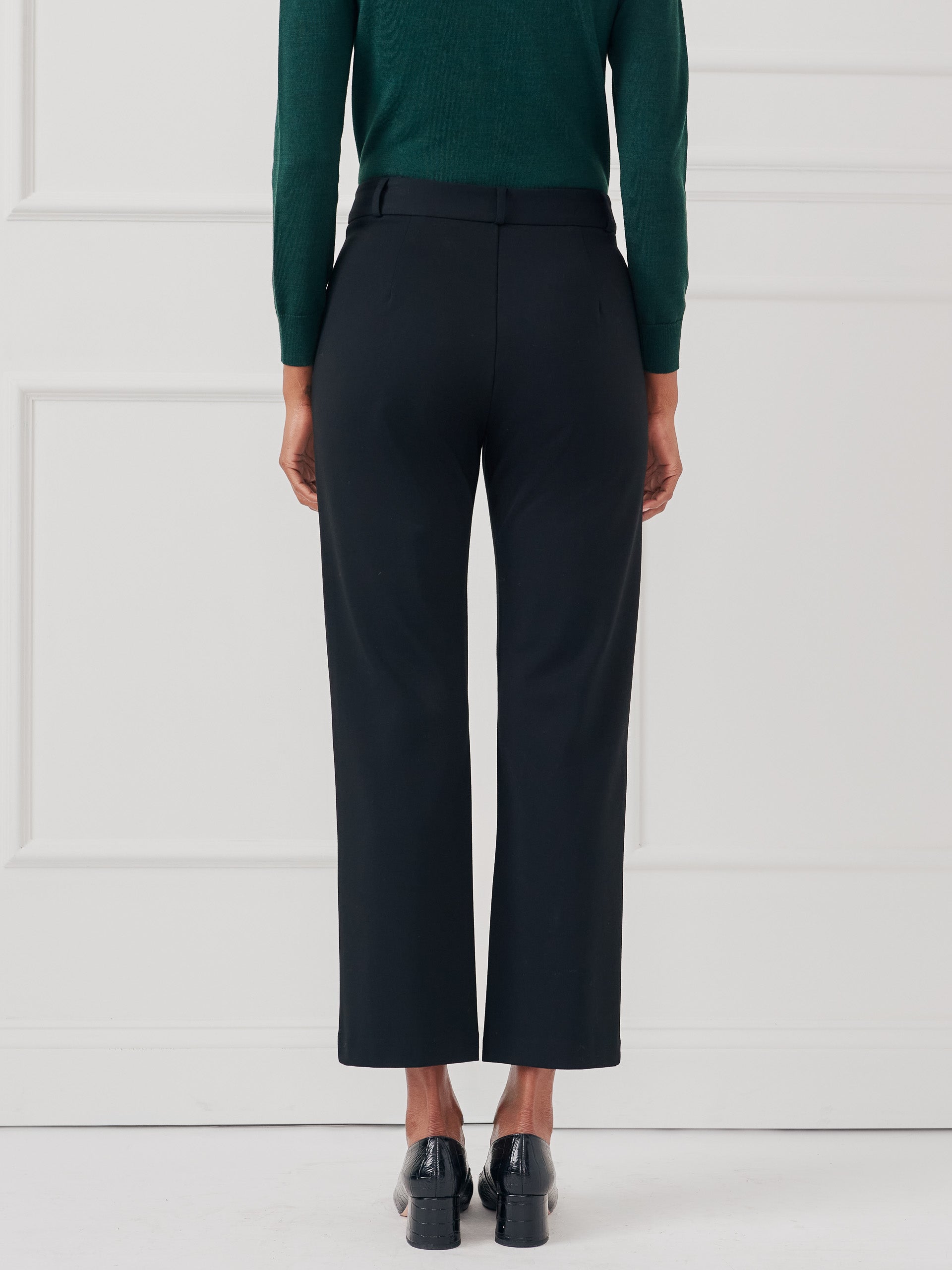 Model wearing J.McLaughlin Deanne pants in black made with Bainbridge fabric.