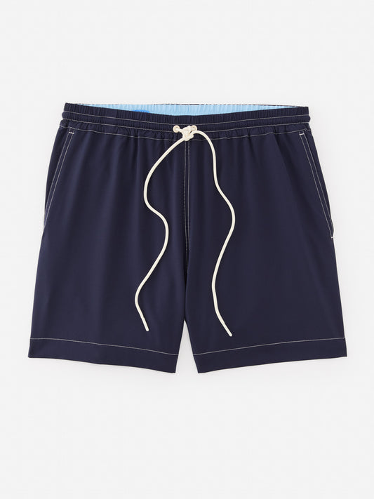 J.McLaughlin Outrigger swim trunks in navy made with polyester and spandex.