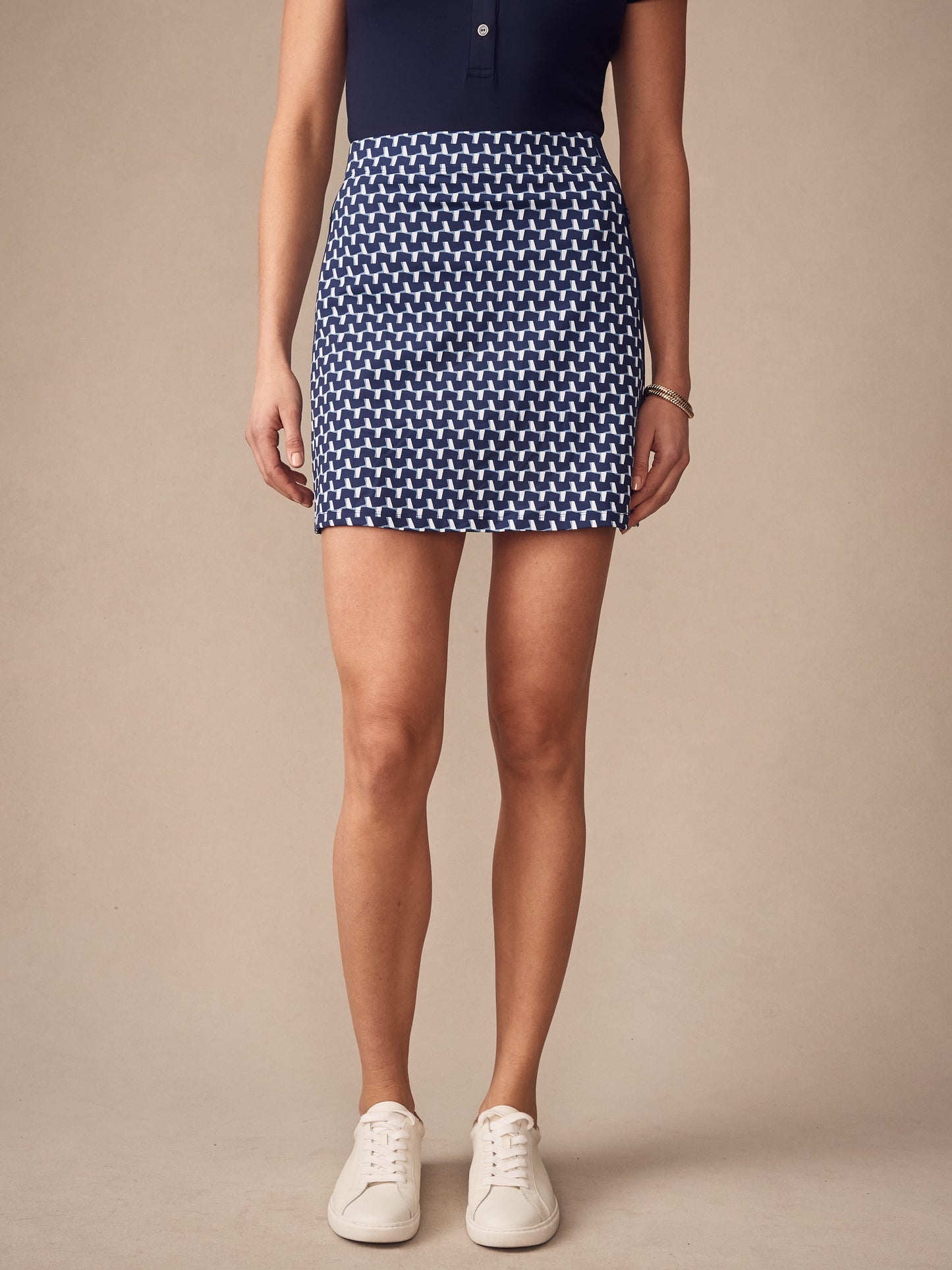 A stylish look featuring the Palm Springs Skort in Duncan by J.McLaughlin, showcasing effortlessly stylish, enduring designs and innovative fabrics. A destination for defining style. Life, Well-Lived.