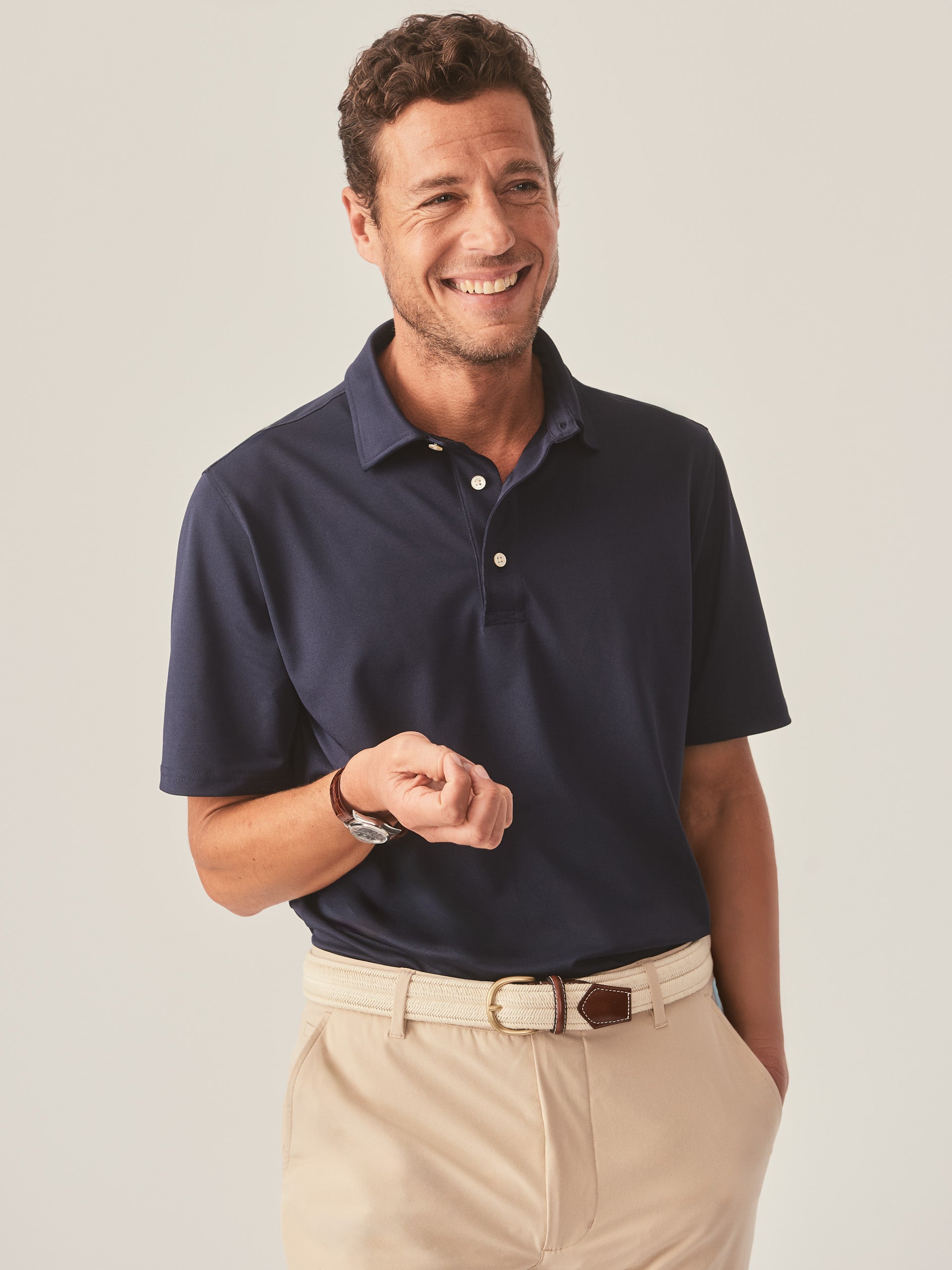 J.McLaughlin Peak performance polo in navy made with polyester/spandex