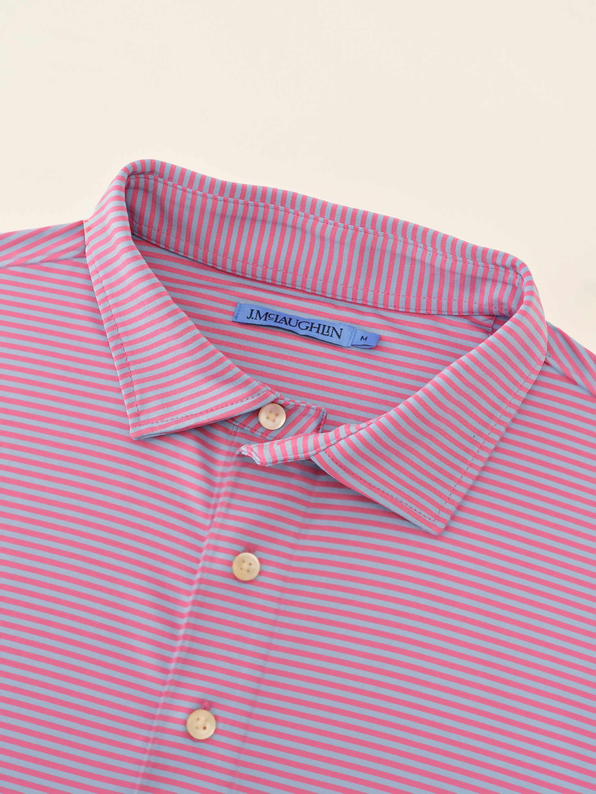 J.McLaughlin Peak polo in Hot Pink/Blue made with Polyester. 