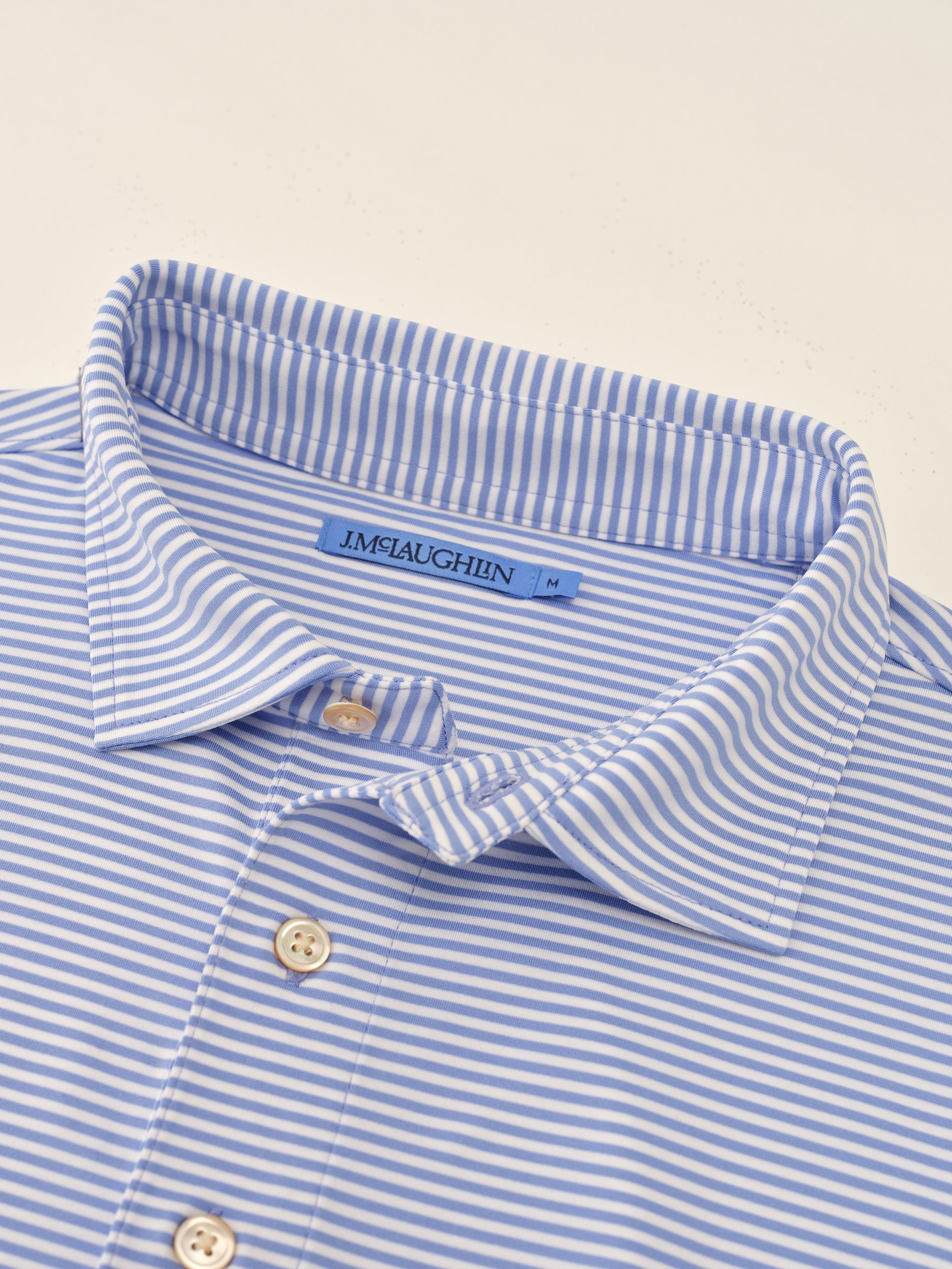 J.McLaughlin Peak polo in White/Light Blue made with Polyester. 