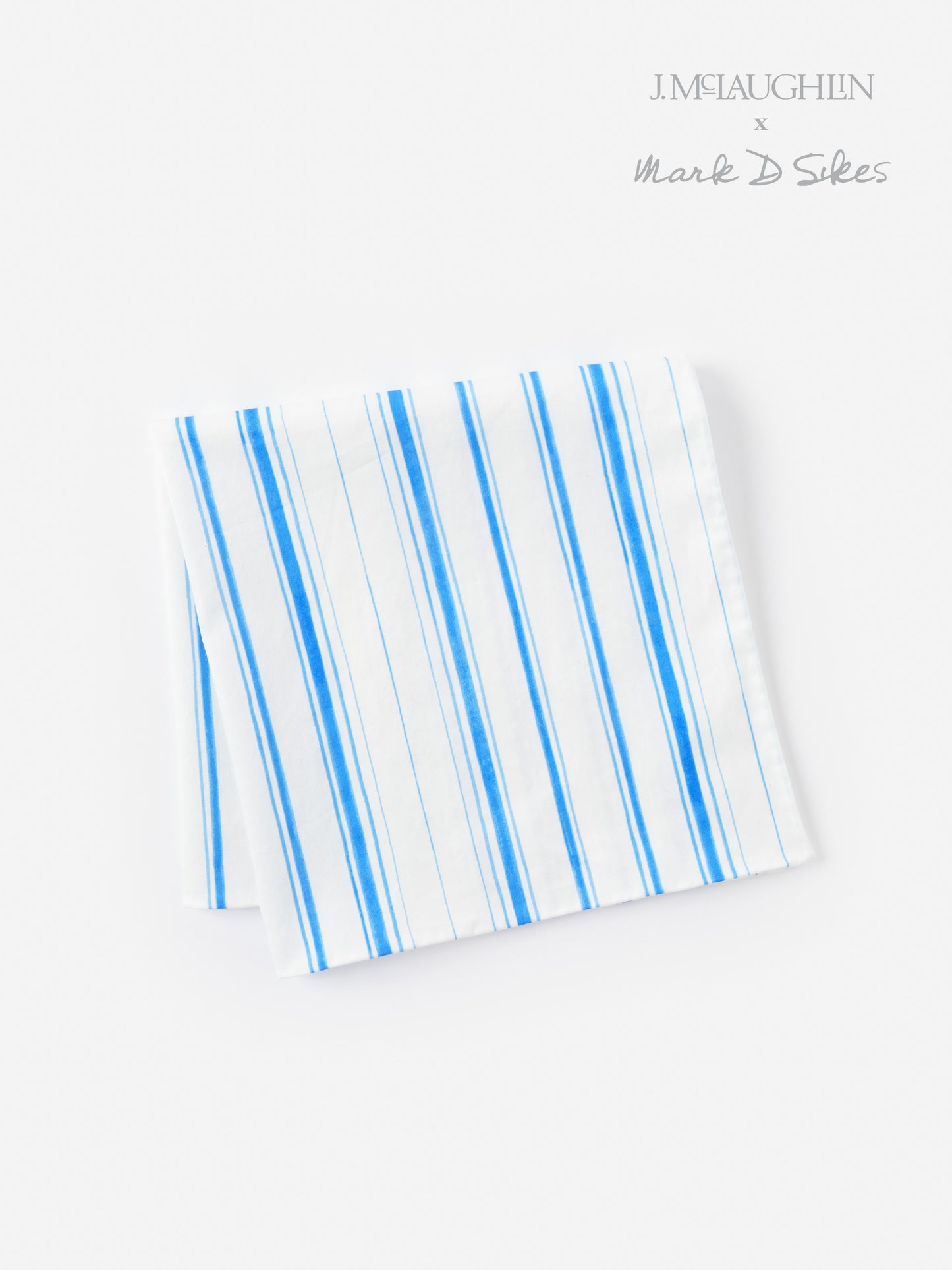 Folded Ralph Neckerchief in Coastal Waterline by J.McLaughlin, featuring blue vertical stripes on white fabric, embodying effortlessly stylish, enduring designs and a legacy of timeless fashion. A destination for defining style. Life, Well-Lived.