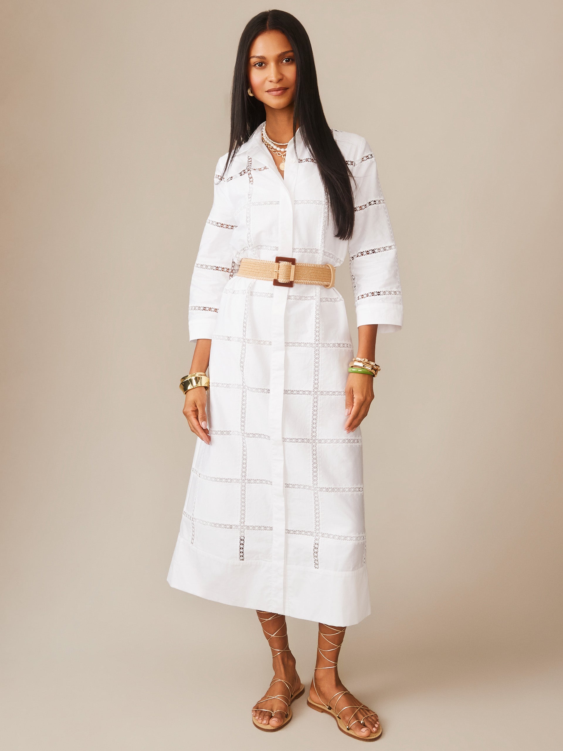 Model wearing the Rachel Embroidered Dress by J.McLaughlin, featuring intricate white embroidery and a beige belt, embodying effortlessly stylish, enduring designs with a legacy of timeless fashion. A destination for defining style. Life, Well-Lived.