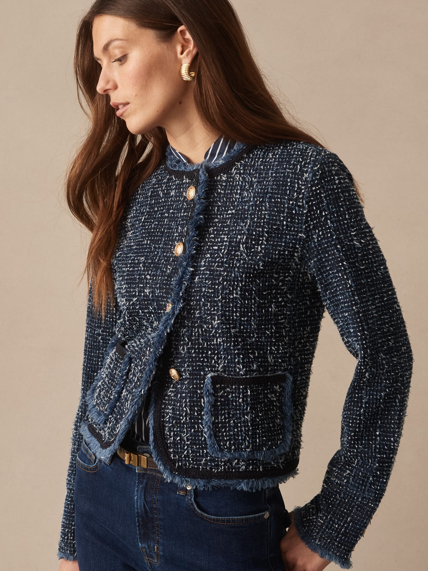 Woman wearing the Renata Jacket by J.McLaughlin, showcasing effortlessly stylish design with enduring fabrics and details, embodying a legacy of timeless fashion. A destination for defining style. Life, Well-Lived.