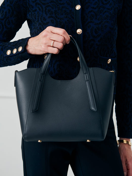 J.McLaughlin Lane handbag in black made with leather. 