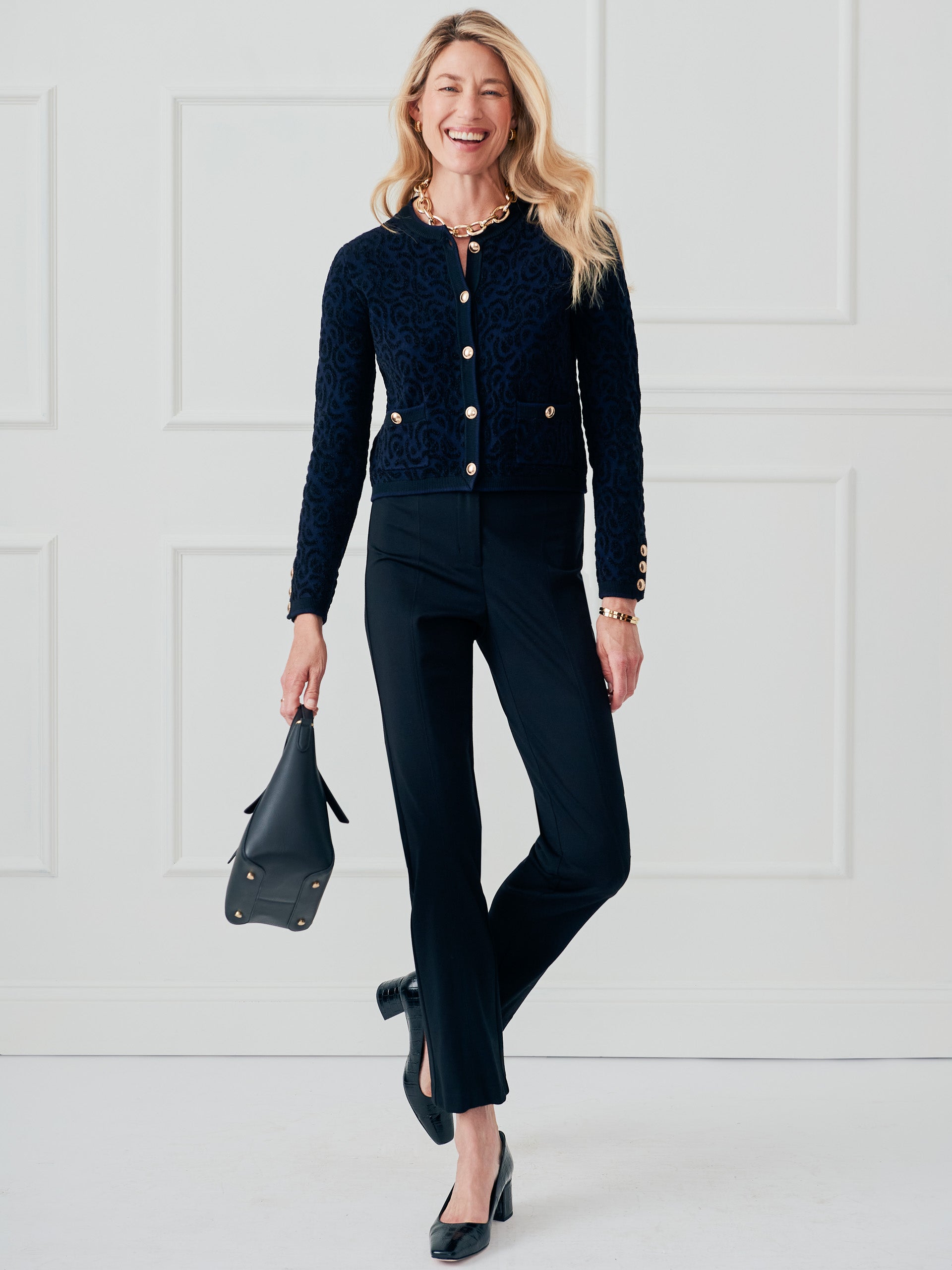 J.McLaughlin Reva sweater in black/navy made with polyester. 