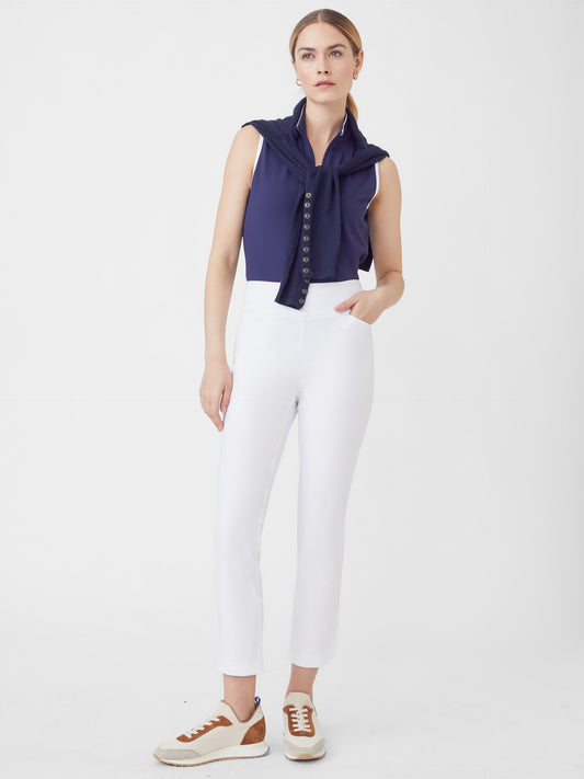 Model wearing J.McLaughlin Romilly pants in white made with Amelia cloth.