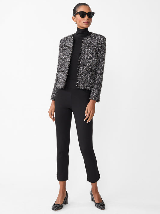 Model wearing J.McLaughlin Romilly pants in black made with Bainbridge fabric.