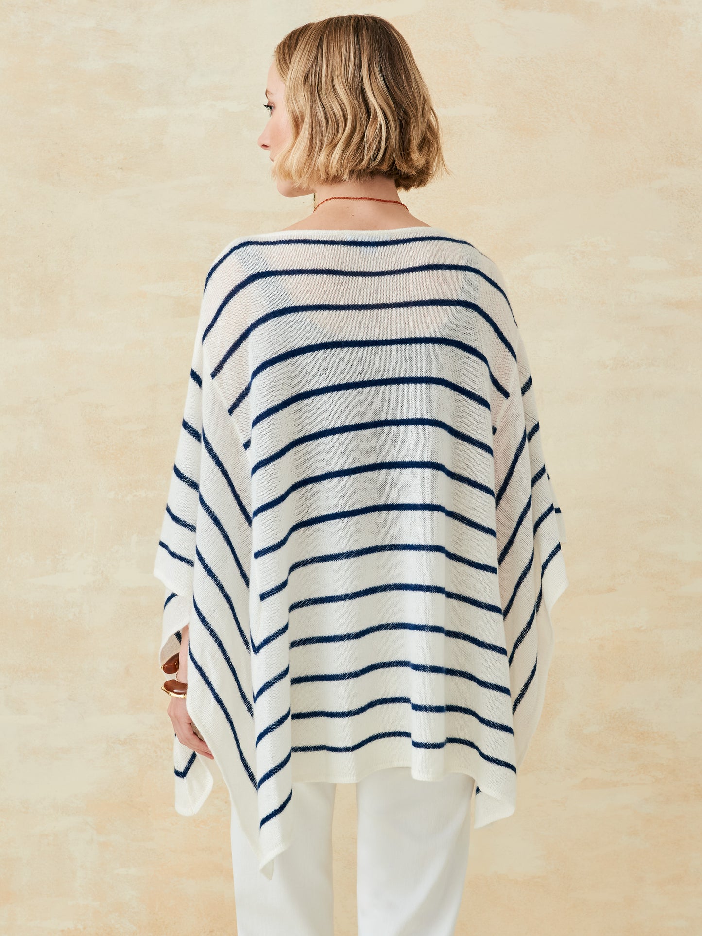 J.McLaughlin Samrithi poncho in off white/dark navy made with cashmere.