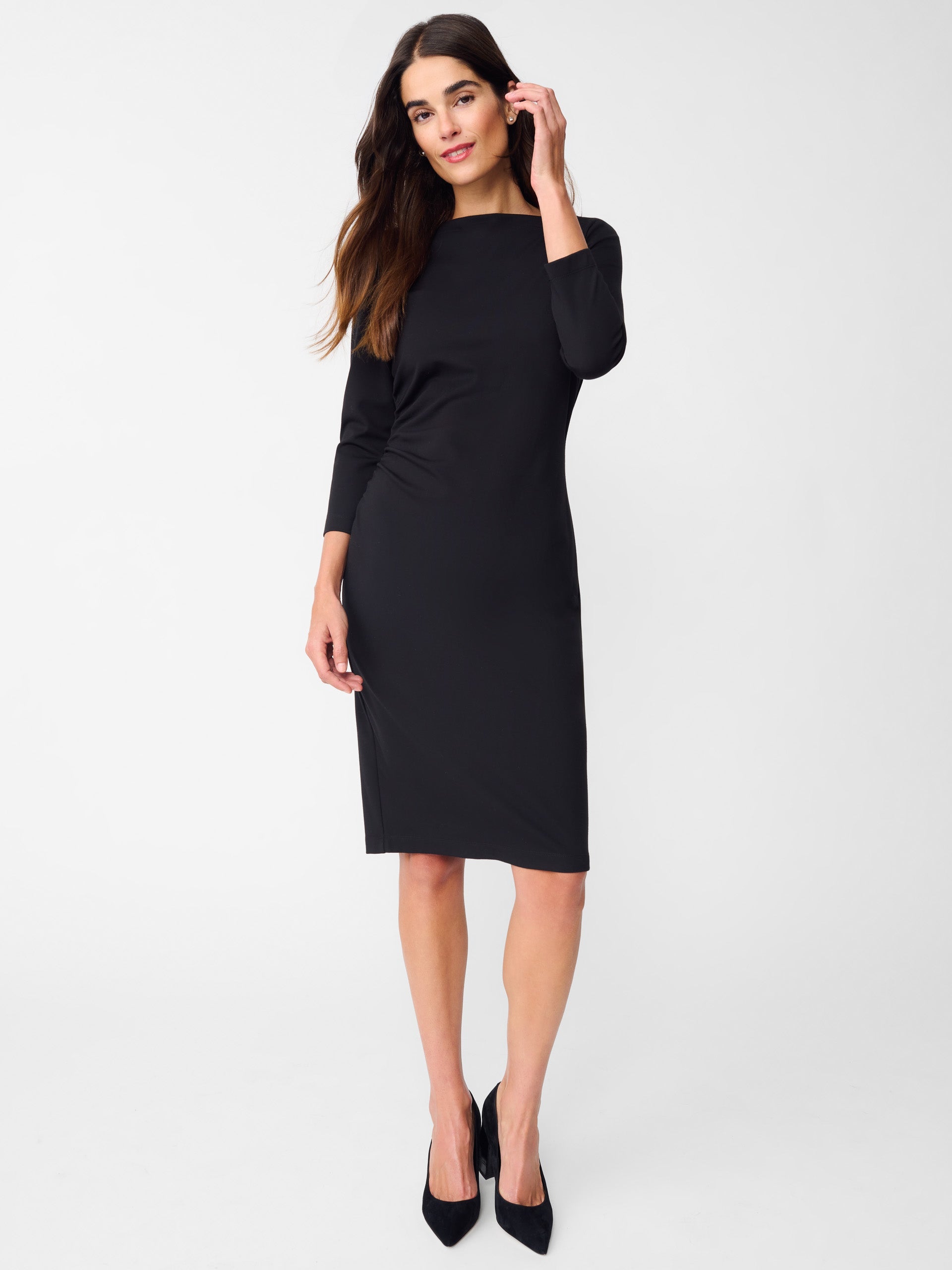 Model wearing J.McLaughlin Sarra dress in black made with refined bainbridge fabric.