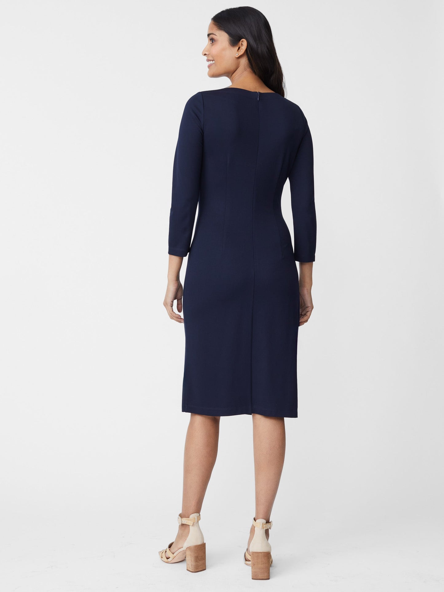 Model wears J.McLaughlin Sarra dress in winter navy made with Refined Bainbridge.