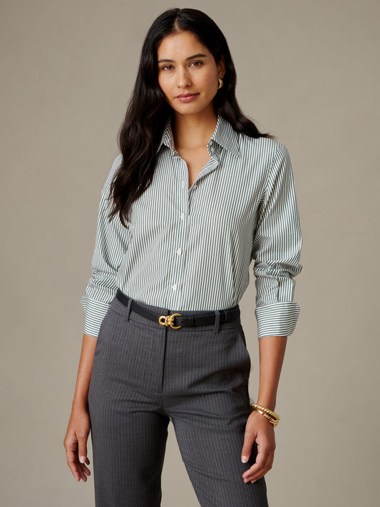 J.McLaughlin Sloane Shirt in Stripe on a woman featuring fine vertical stripes wide cuffs and a crisp cotton poplin silhouette styled with tailored trousers