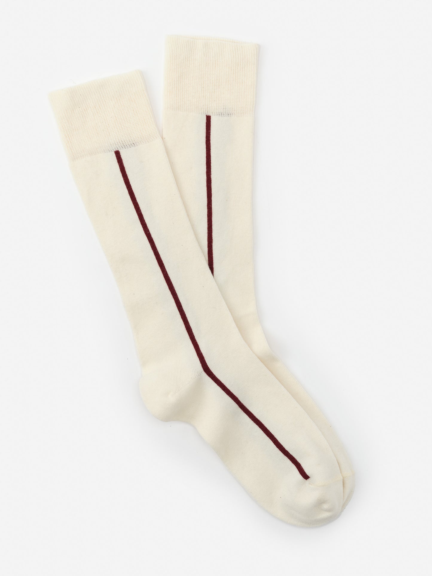 Socks in Line by J.McLaughlin feature an effortlessly stylish cream base with a subtle burgundy line, showcasing enduring designs and innovative fabrics for a legacy of timeless fashion. A destination for defining style. Life, Well-Lived.