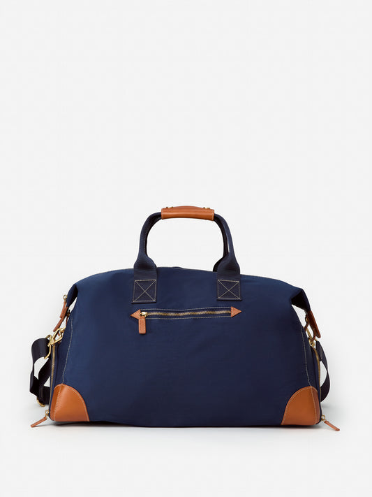 J.McLaughlin Stanley weekender bag in navy made with nylon and leather.
