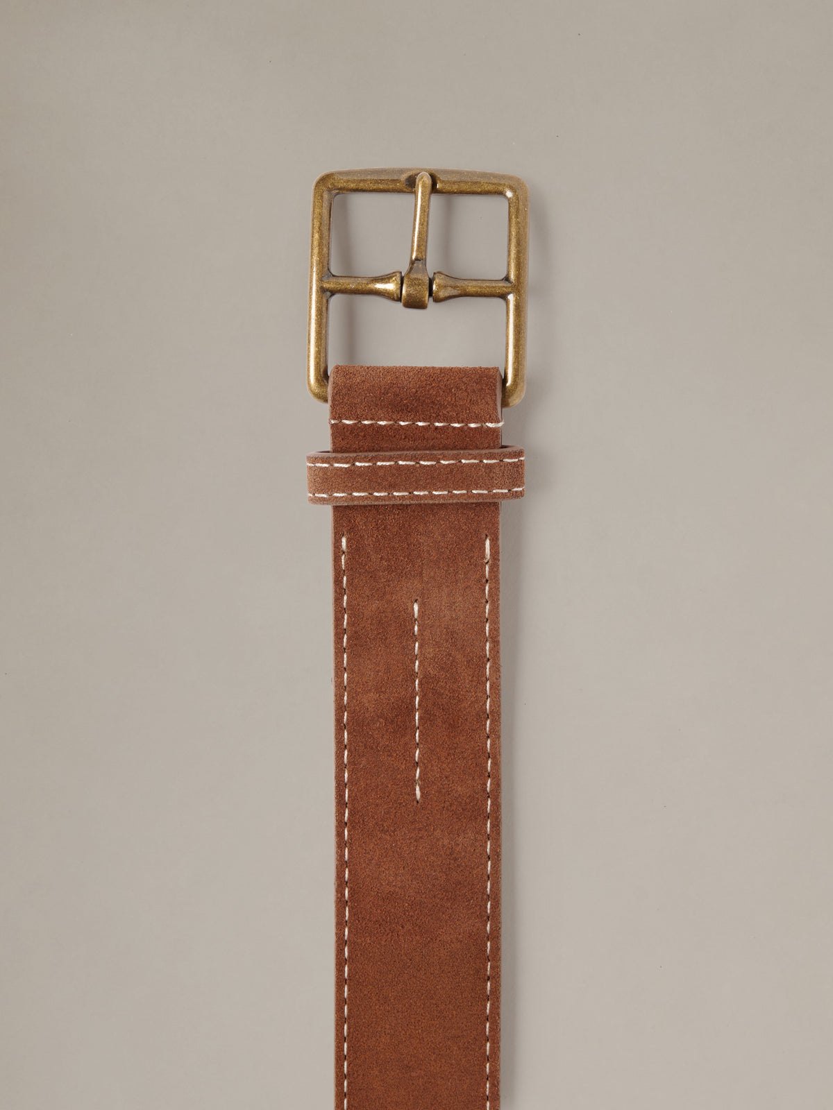 Suede Belt by J.McLaughlin in rich brown suede with contrast stitching and a brass buckle for timeless everyday style