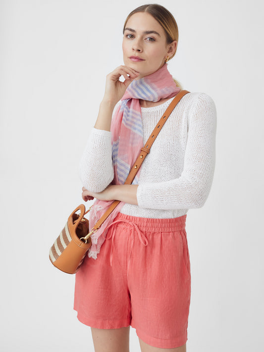 J.McLaughlin model wears Surya Linen Shorts in Apricot made with Linen.