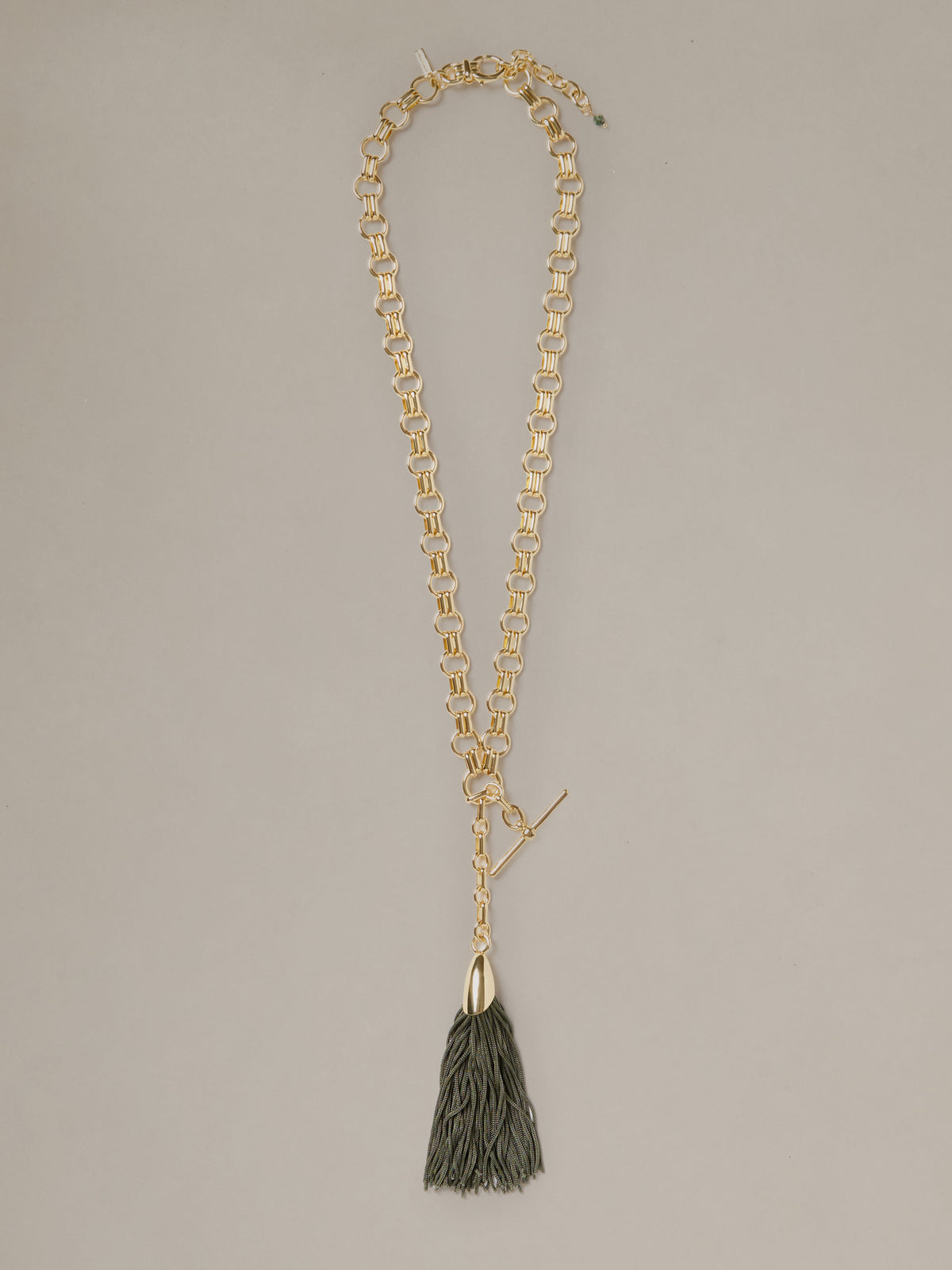 J.McLaughlin Tassel Toggle Necklace with a gold chain toggle closure and elegant dark tassel pendant for effortlessly stylish everyday wear