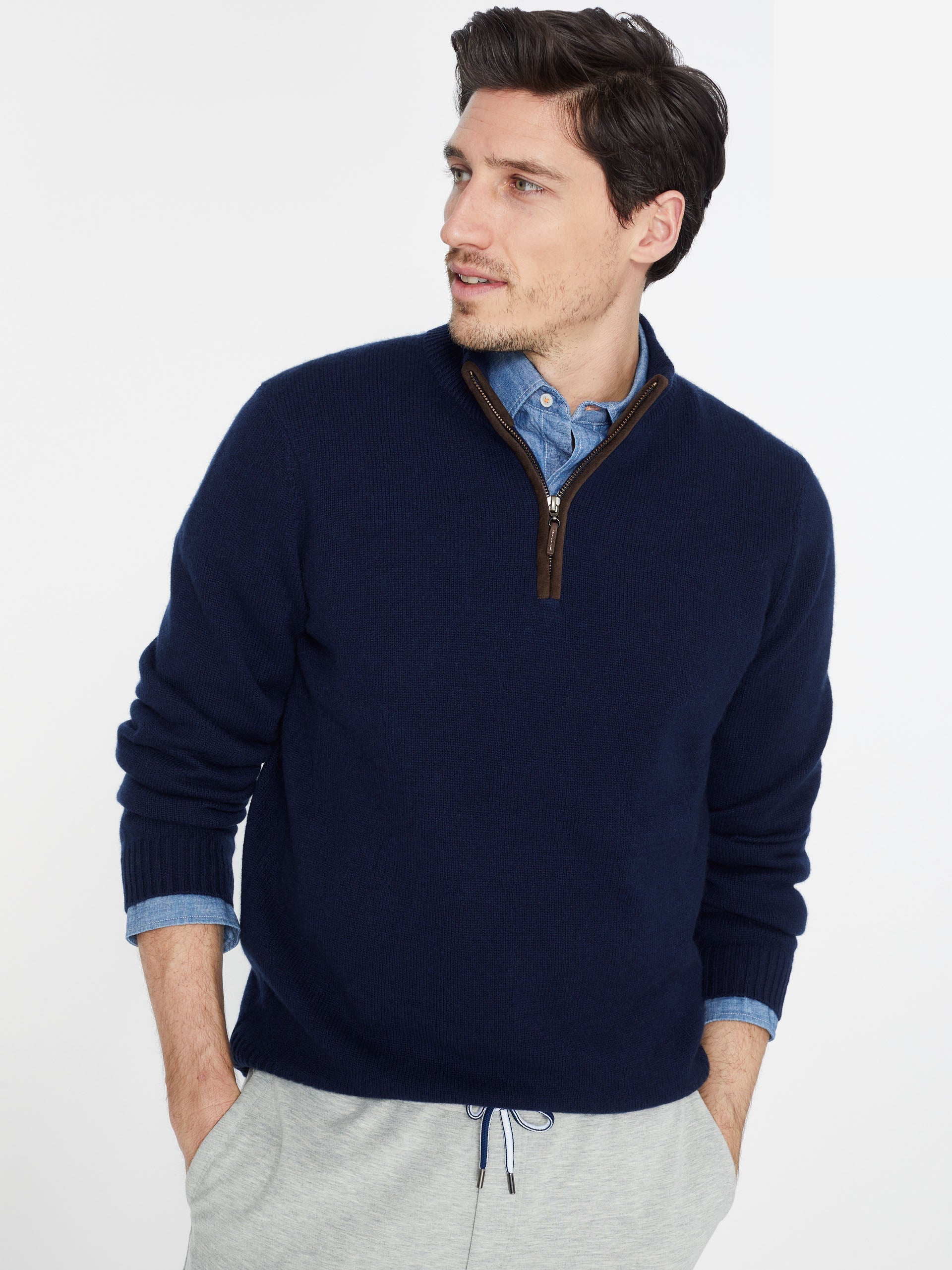 Model wearing J.McLaughlin Tate Sweater in classic navy made with cashmere.