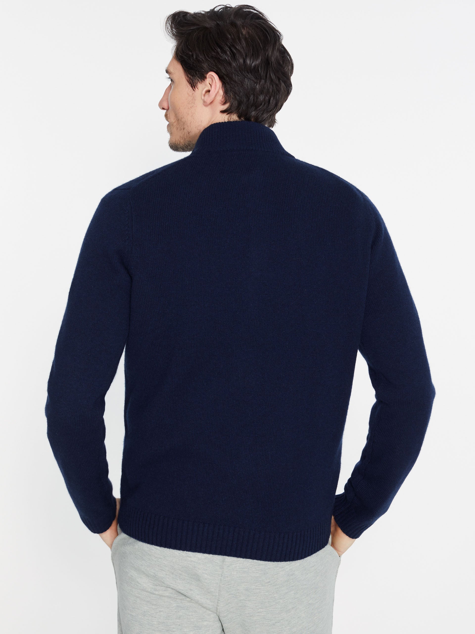 Model wearing J.McLaughlin Tate Sweater in classic navy made with cashmere.