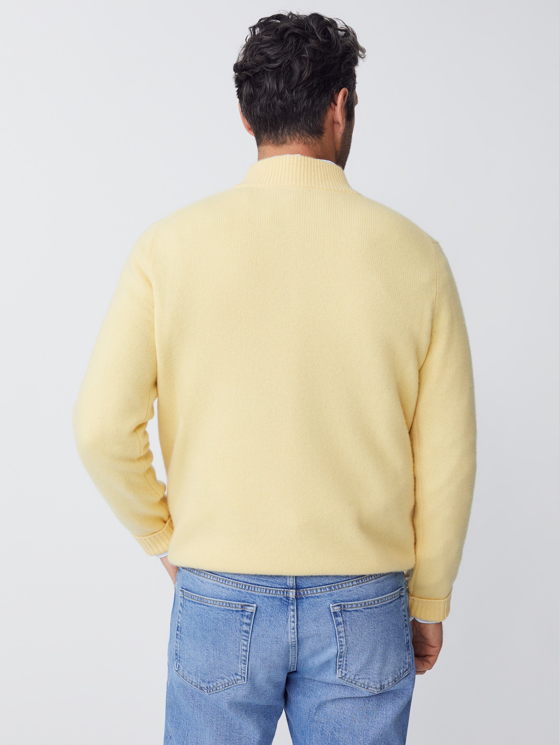 Model wearing J.McLaughlin Tate sweater in yellow made with cashmere.