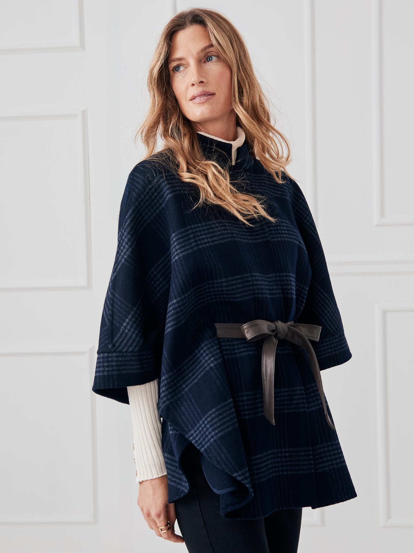 J.McLaughlin Terin ponchos in dark navy made with wool/viscose.