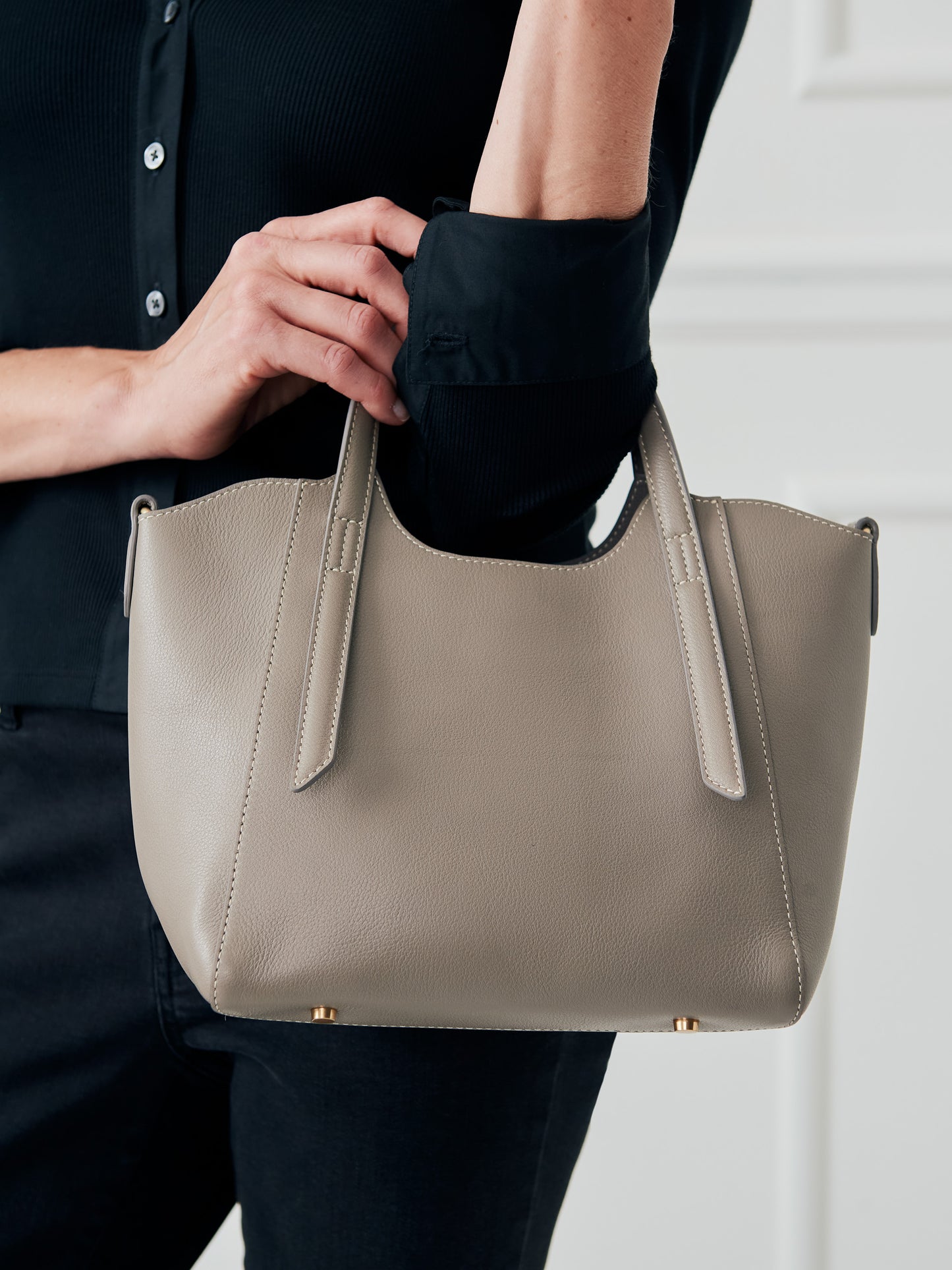 J.McLaughlin Lane handbag in taupe made with leather. 