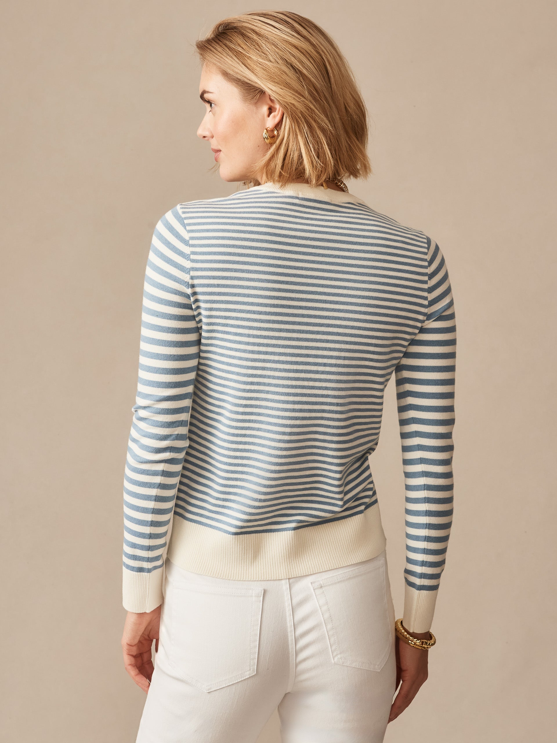J.McLaughlin Tierney sweater in egret white/denim blue made with a cotton blend.
