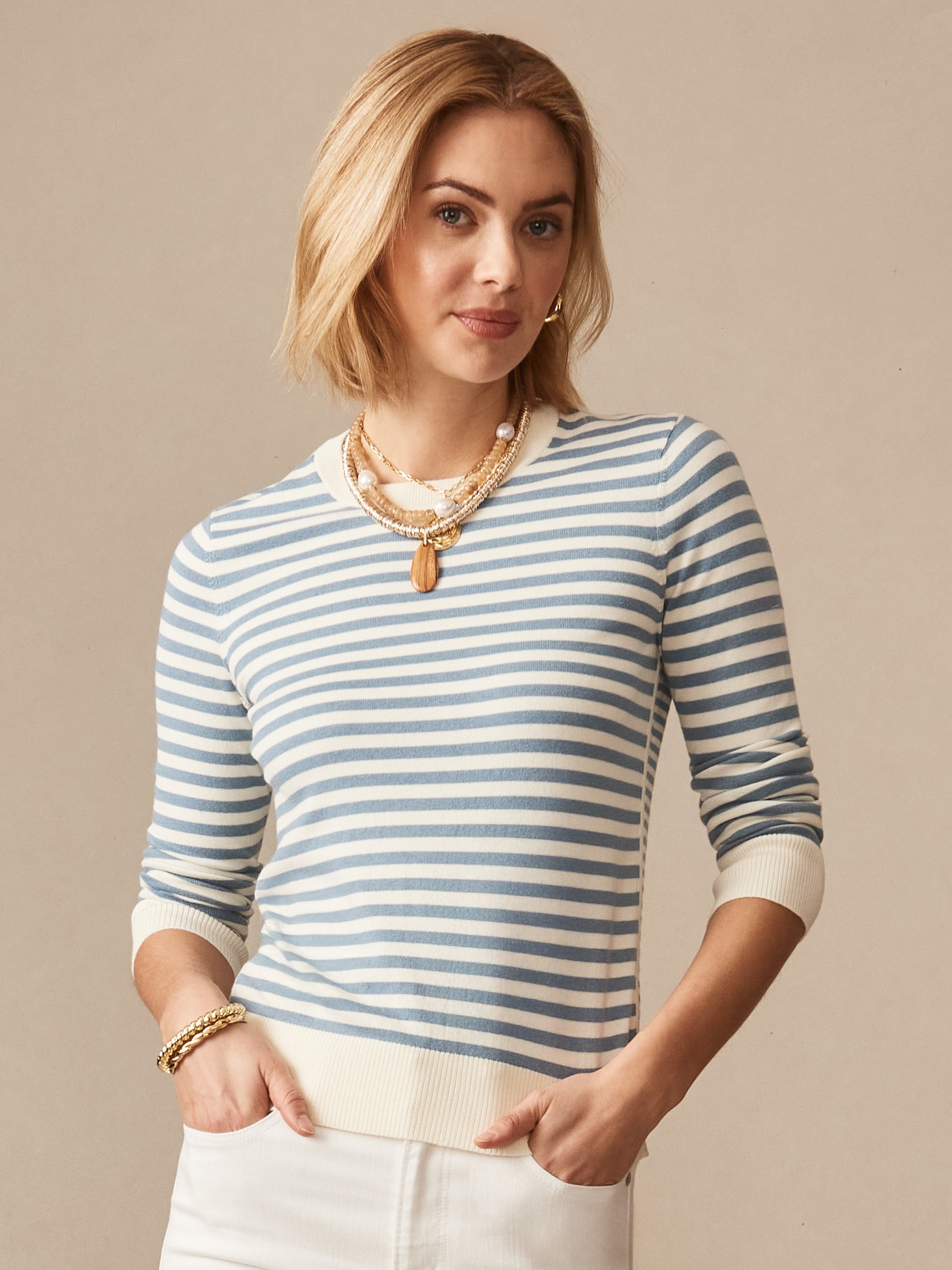 J.McLaughlin Tierney sweater in egret white/denim blue made with a cotton blend.