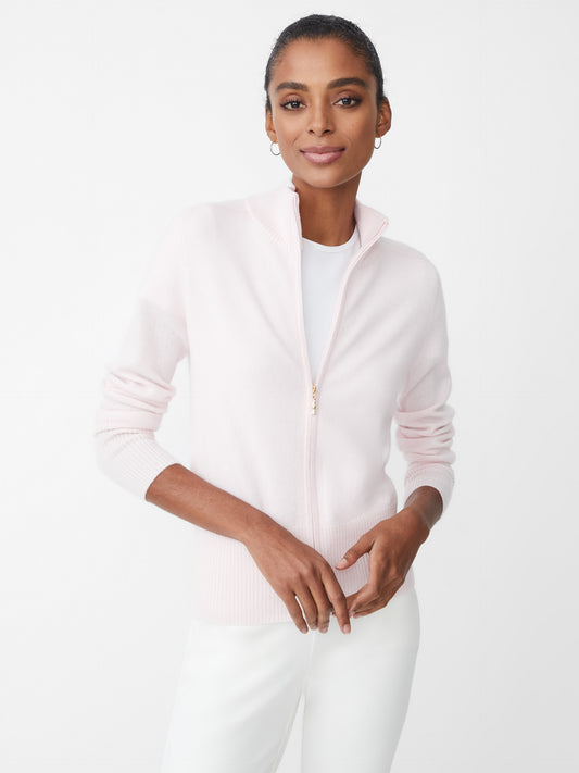 Model wearing J.McLaughlin TIlda sweater in icy pink made with cashmere.