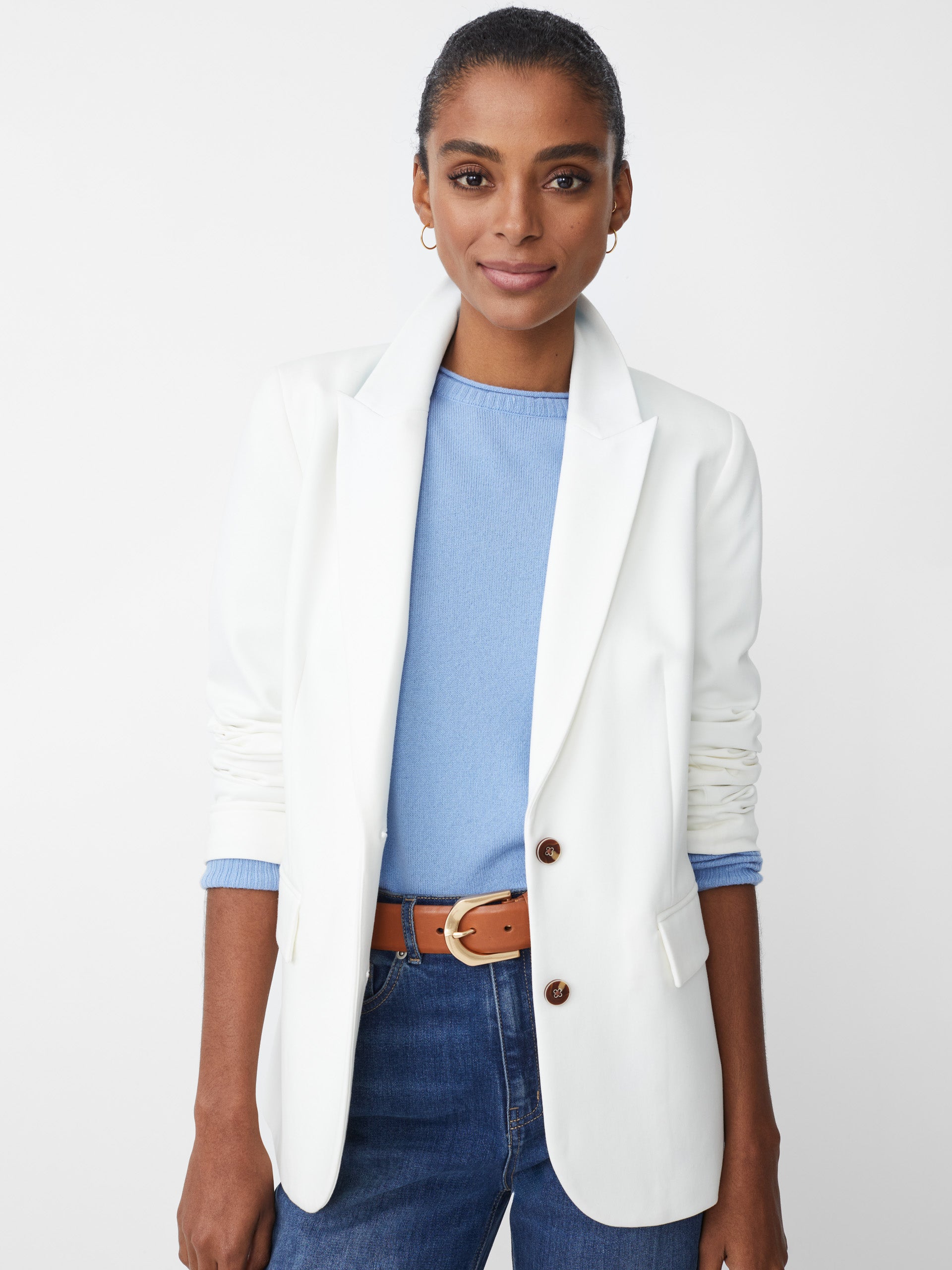 Model wearing J.McLaughlin Triana blazer in white made Bainbridge fabric.