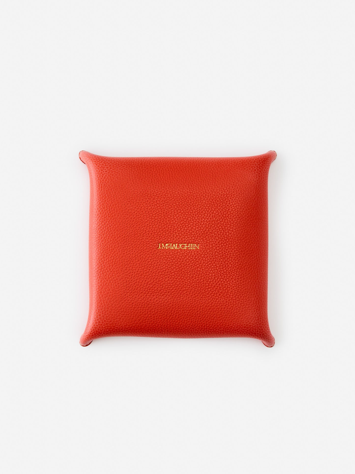 J.McLaughlin Trinket tray in orange made with leather.