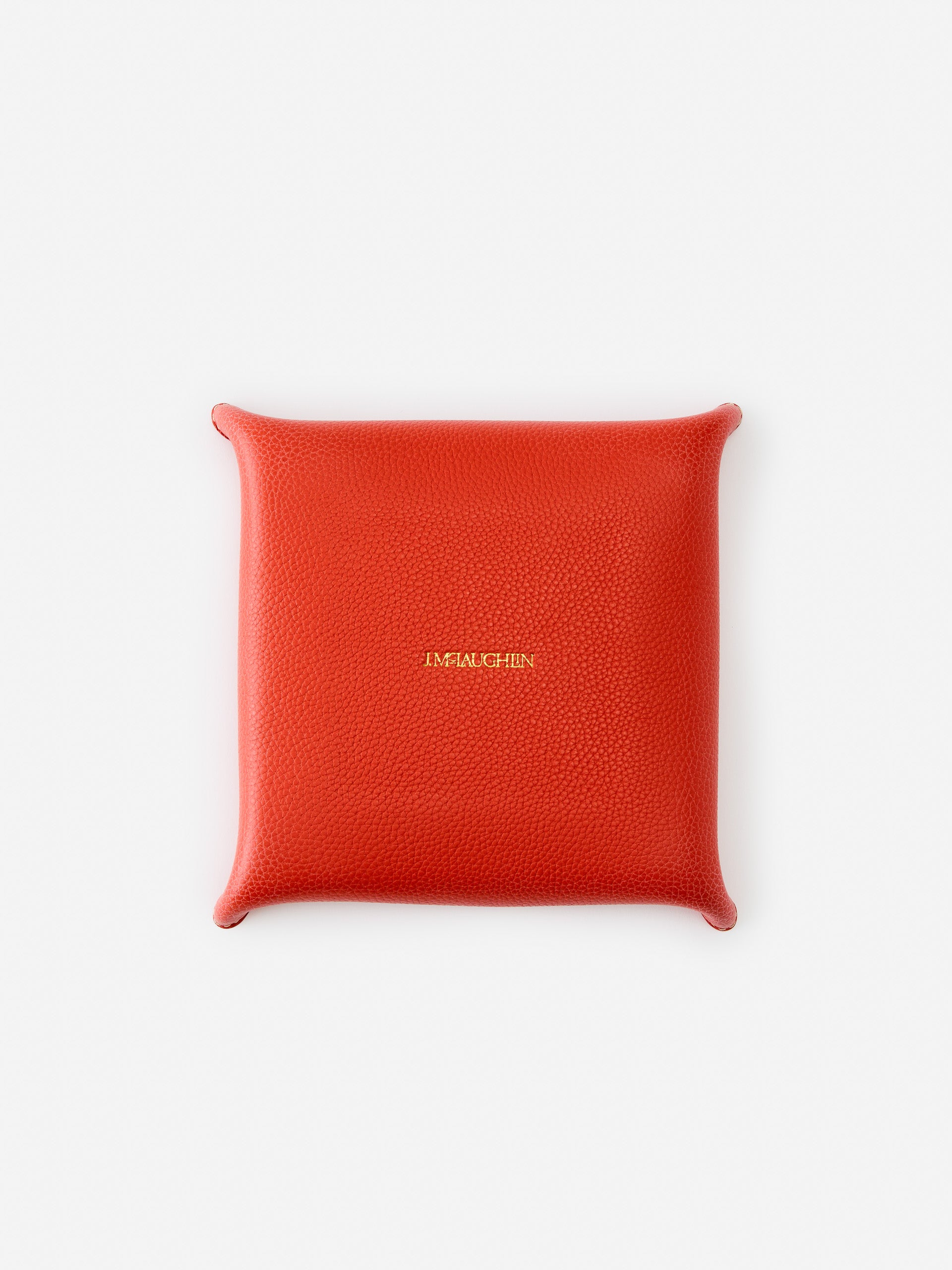 J.McLaughlin Trinket tray in orange made with leather.