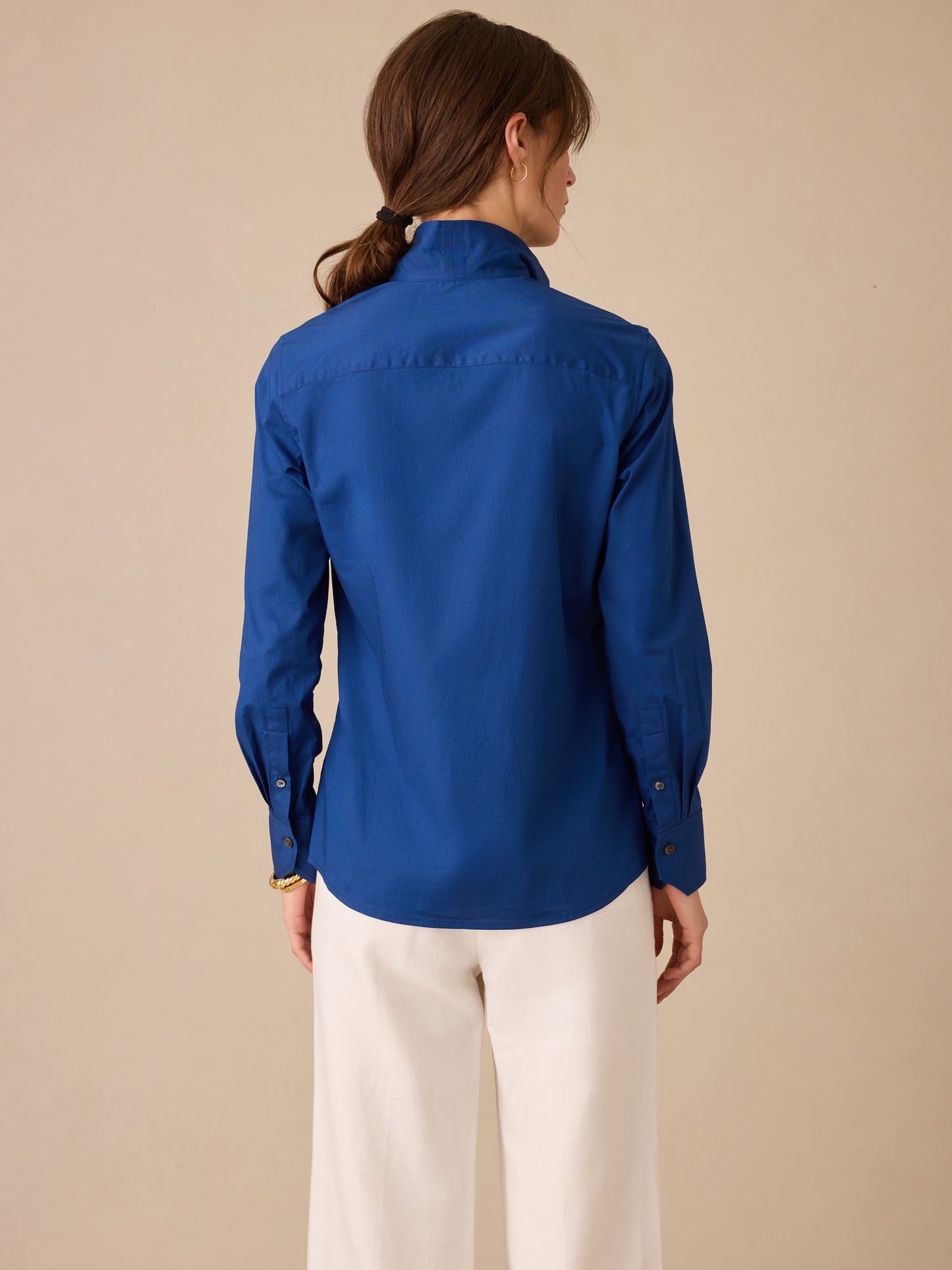 Victoria Shirt in rich navy from J.McLaughlin, showcasing effortlessly stylish design and enduring craftsmanship crafted with innovative fabrics for a legacy of timeless fashion. A destination for defining style. Life, Well-Lived.